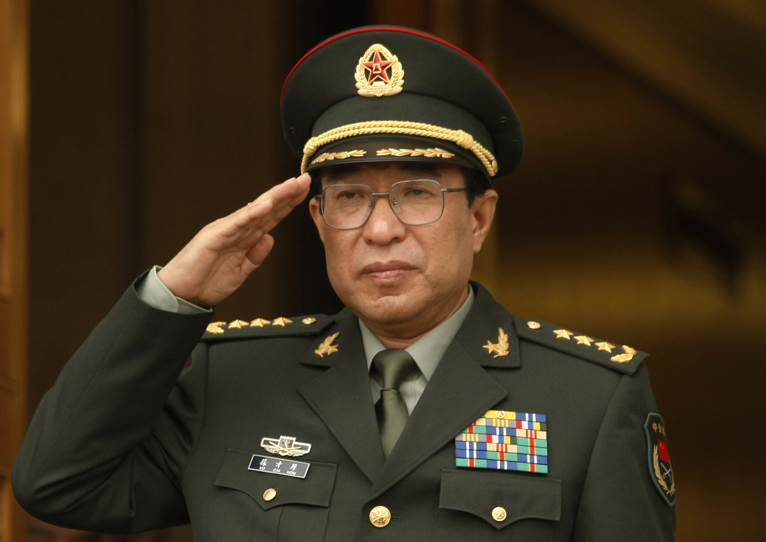 Xi keeps rubbery grip on corruption purge