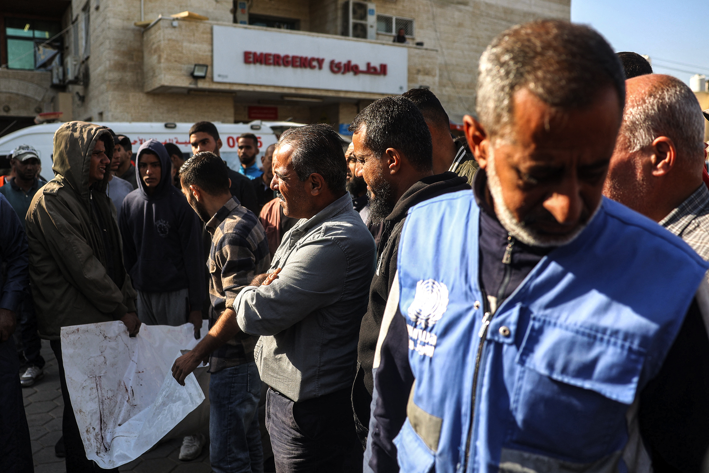 An UNRWA staff member after a bombardment near Al-Aqsa Martyrs Hospital in Deir el-Balah in the centre of Gaza.