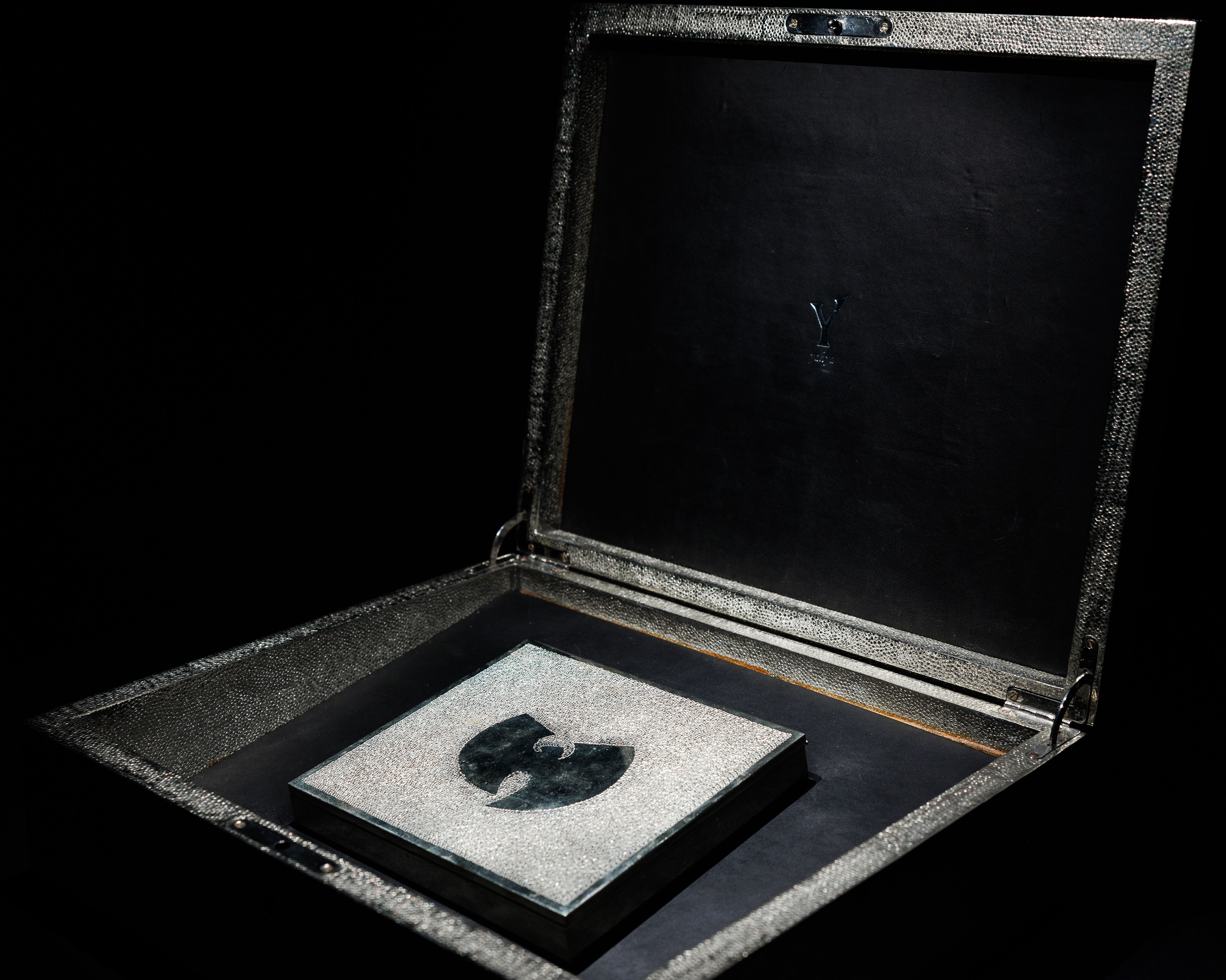 A case encrusted with gemstones holds the Wu-Tang Clan's secret album, Once Upon a Time in Shaolin on CD.