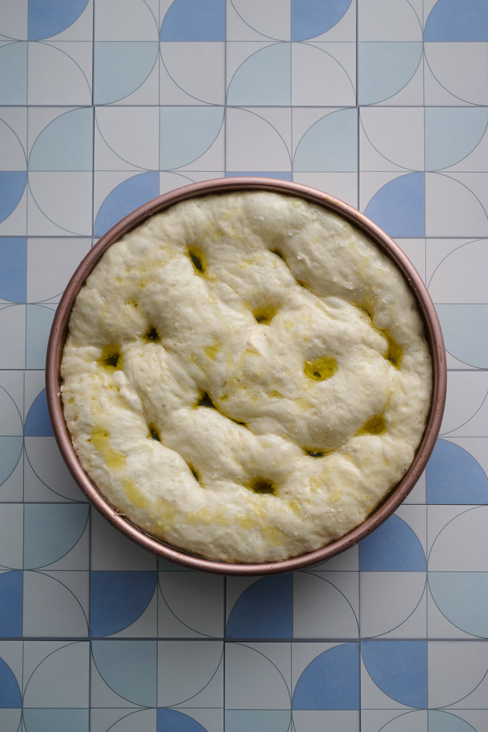 Focaccia mix in a pink tin.