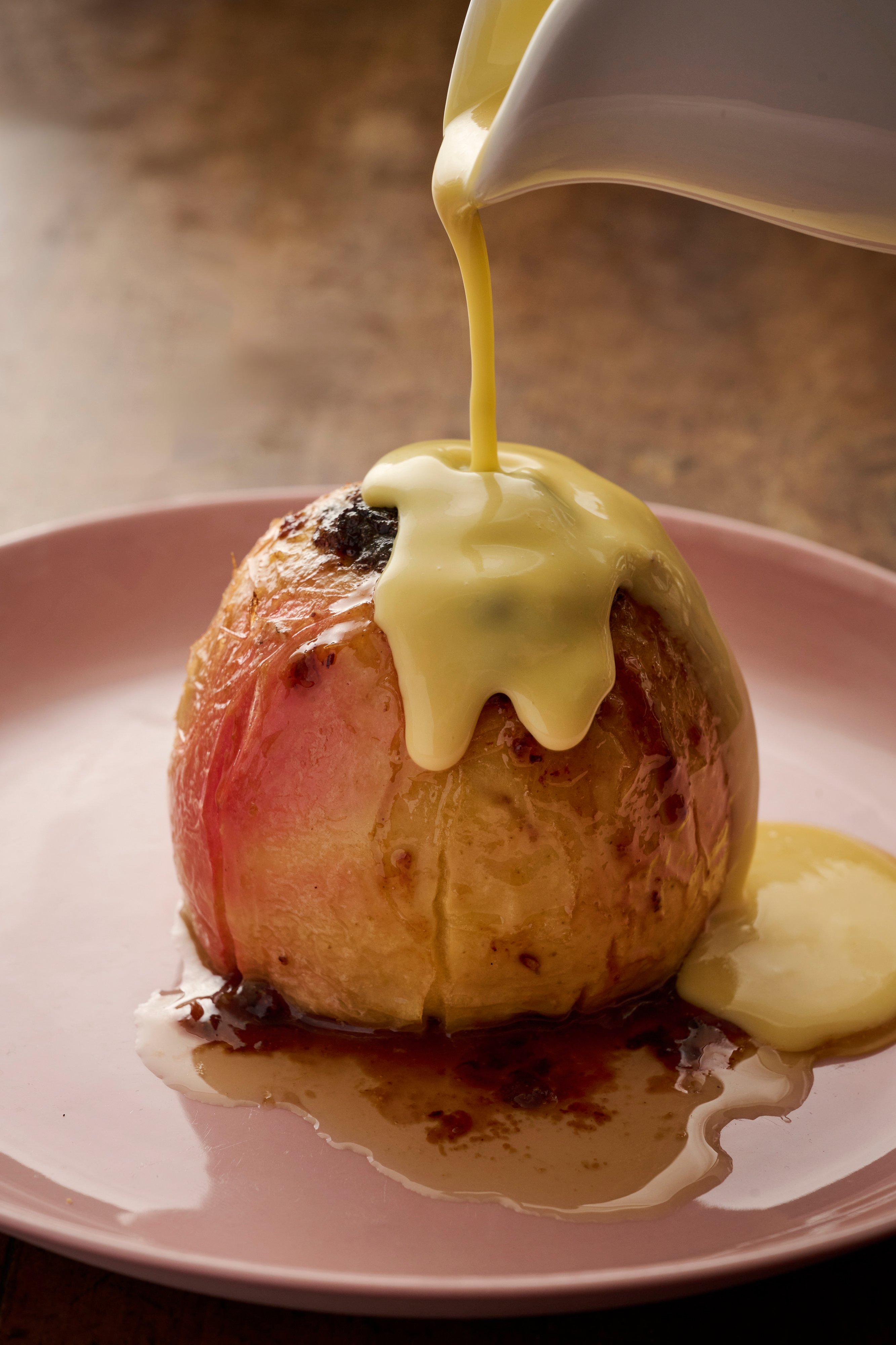 Fruit mince-stuffed apples with calvados custard