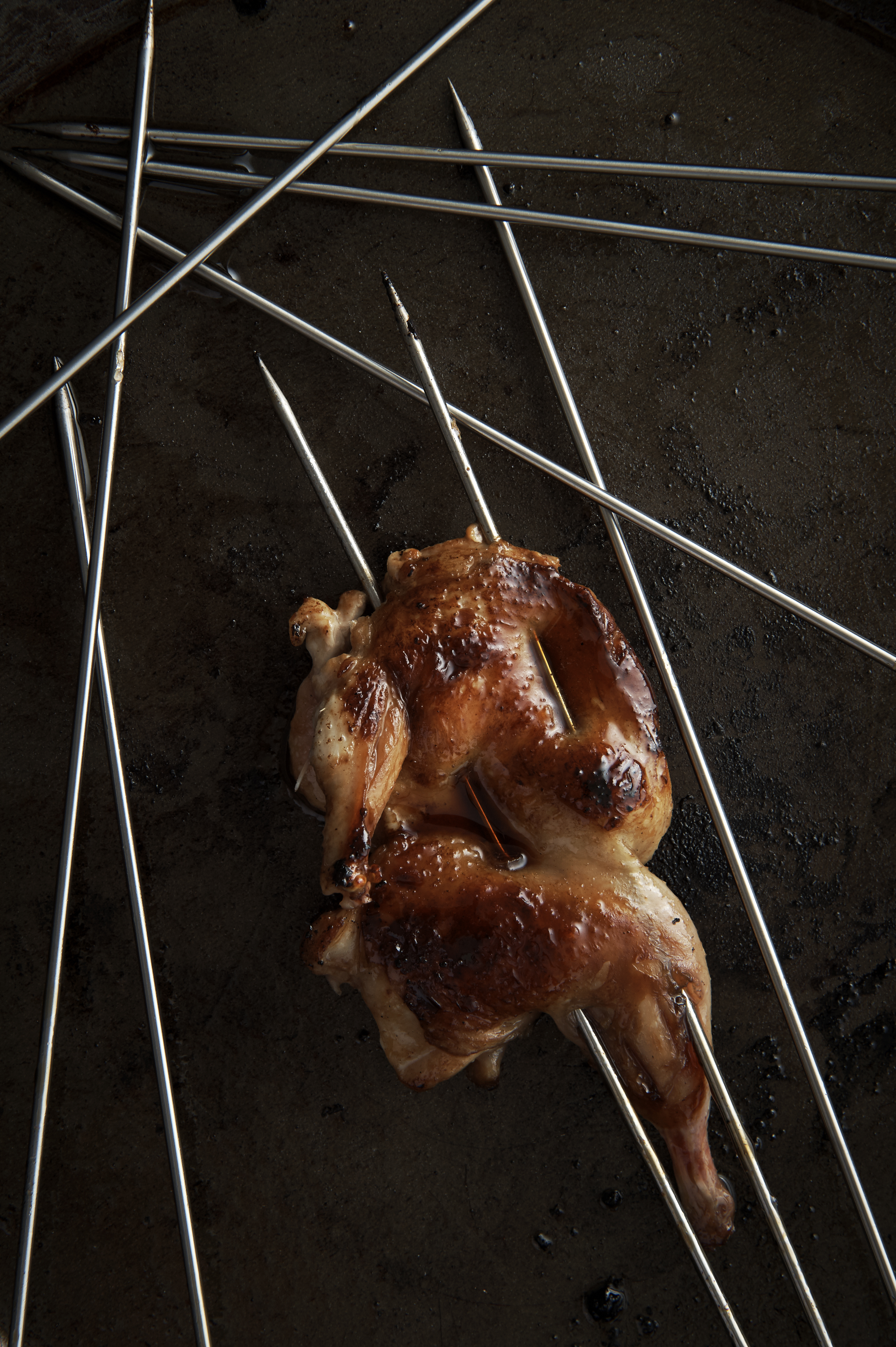 Grilled quail with green mango salad