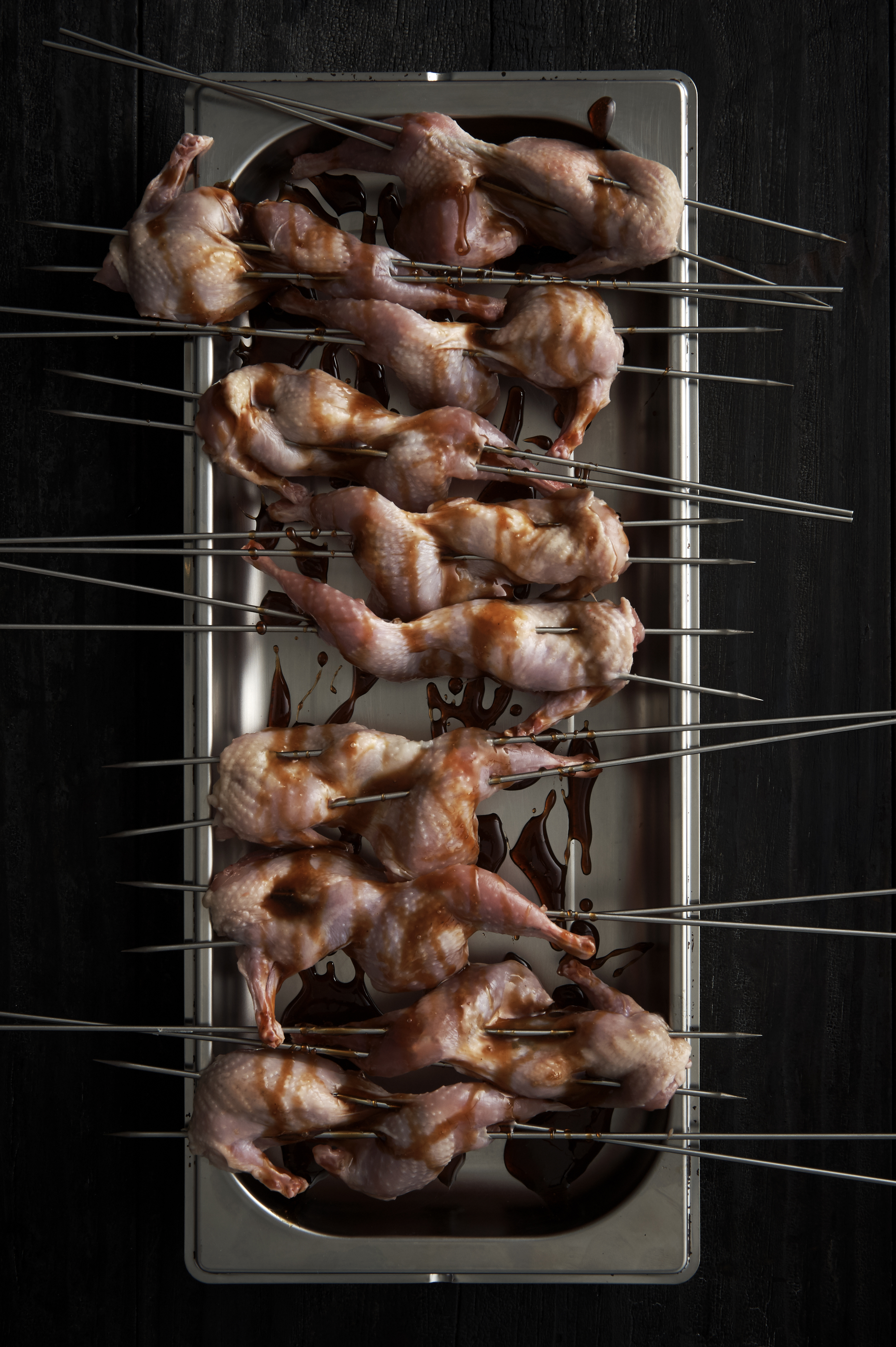 Grilled quail with green mango salad