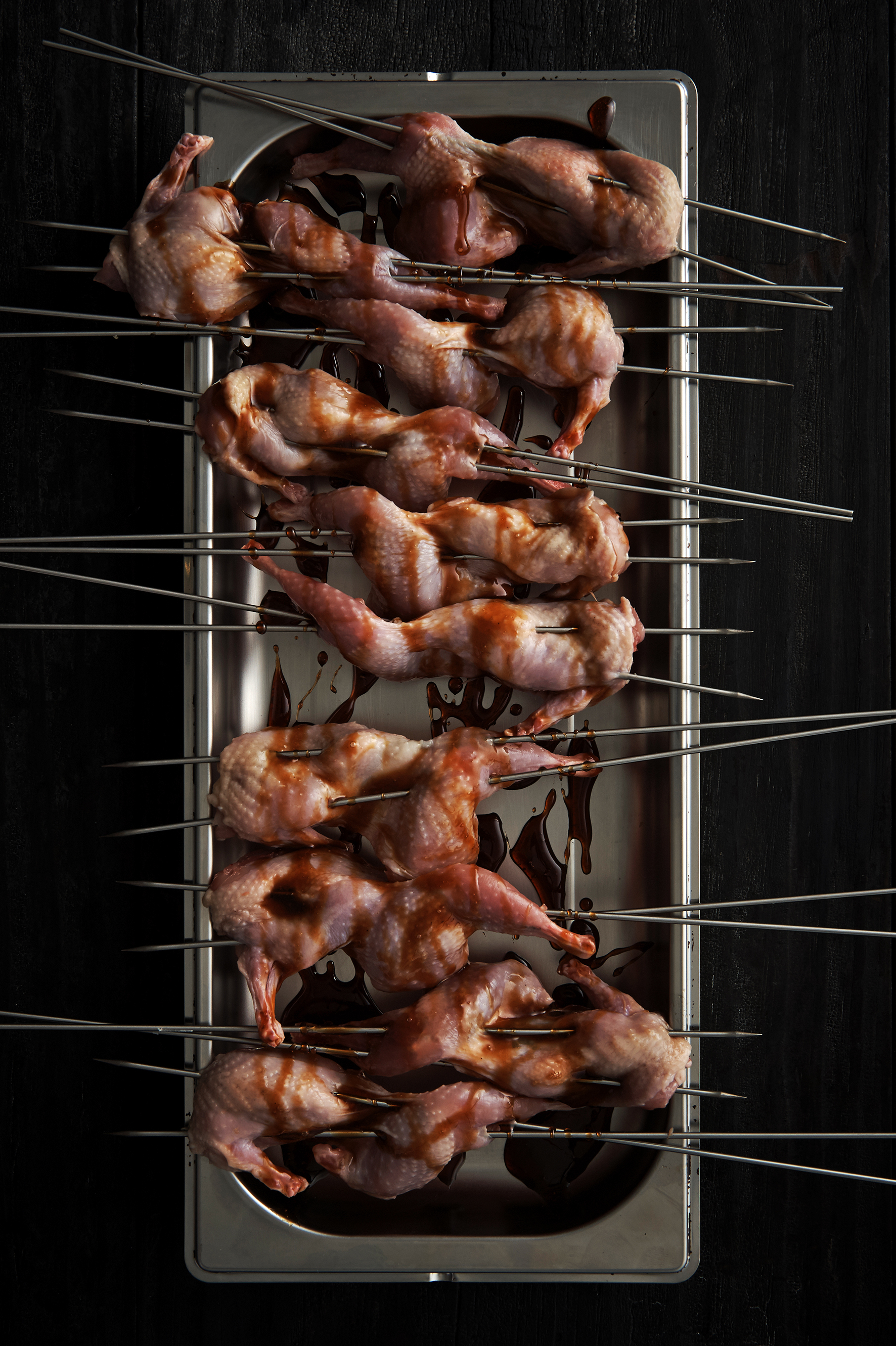 Grilled quail with green mango salad