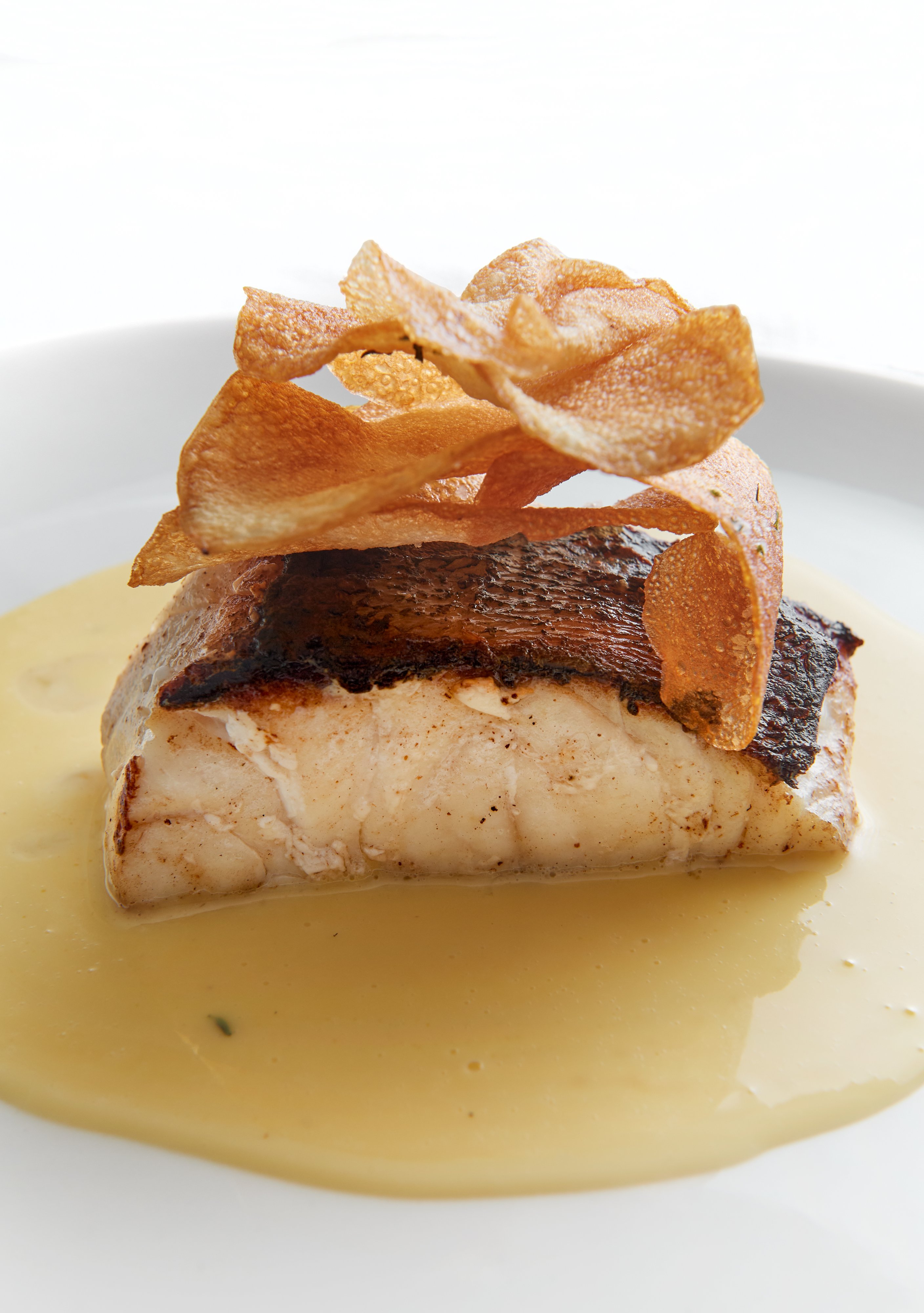 Brined fish with lemon beurre blanc