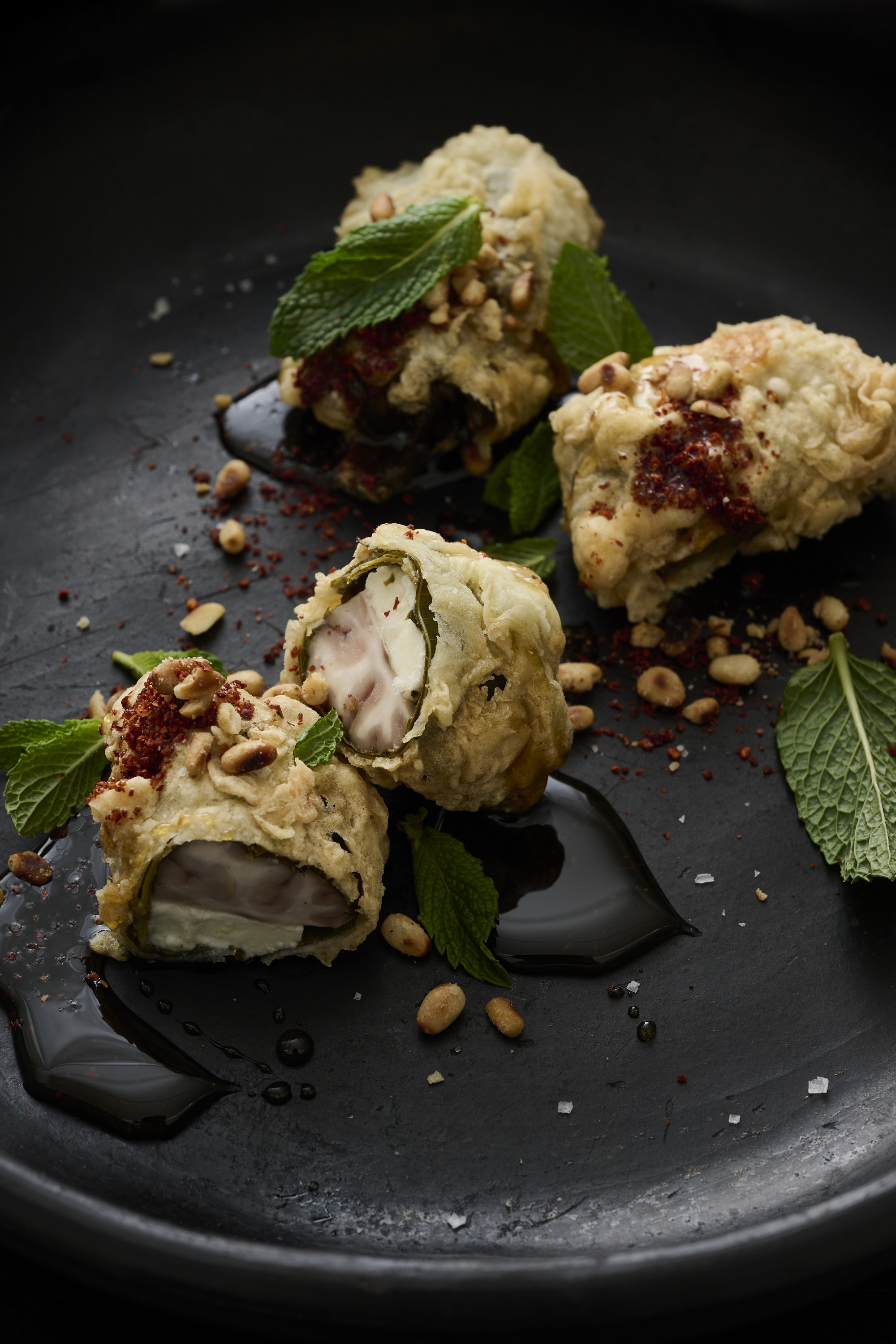 Vine leaf, feta and lamb’s brain fritters