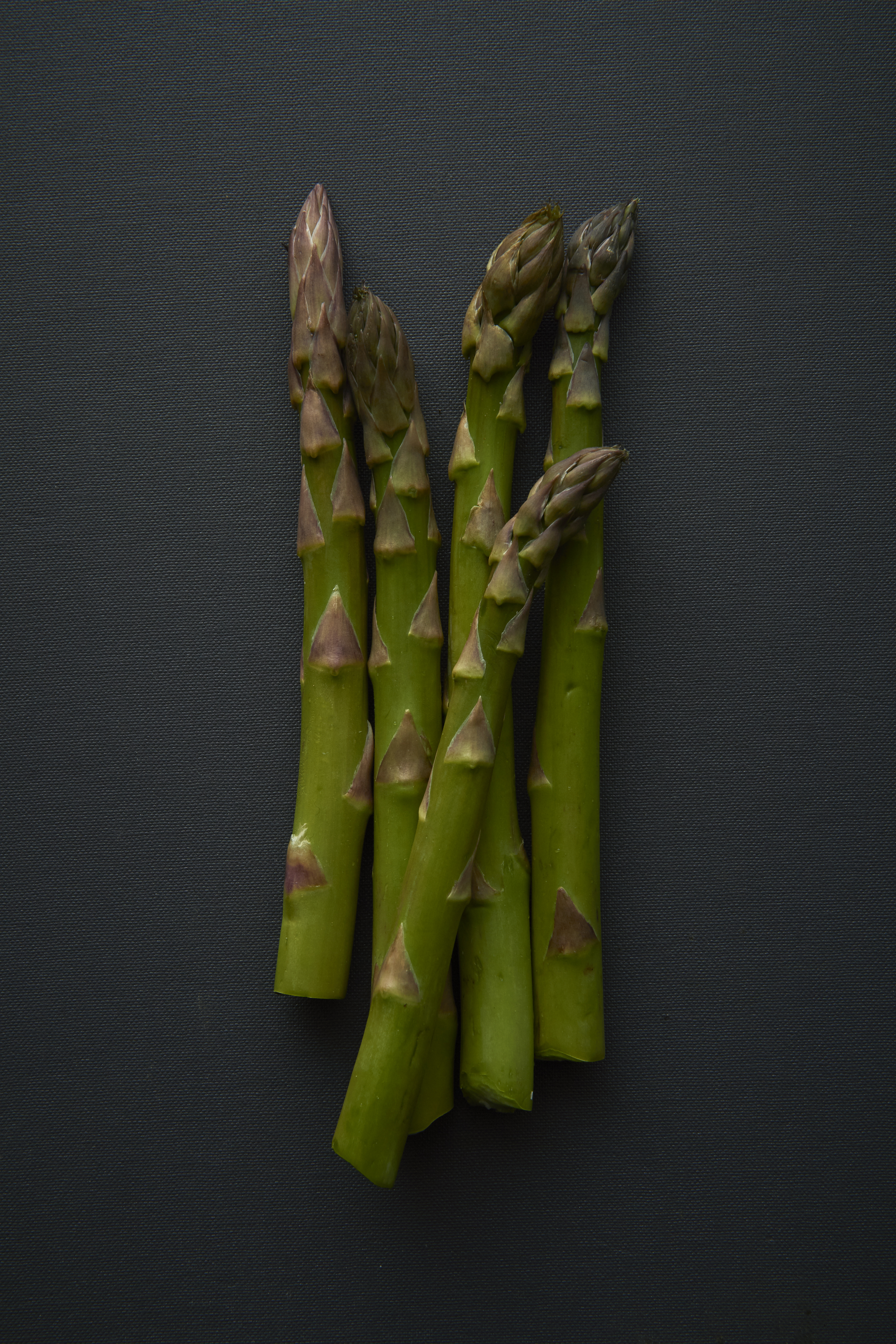 Poached eggs with asparagus and morels on toast