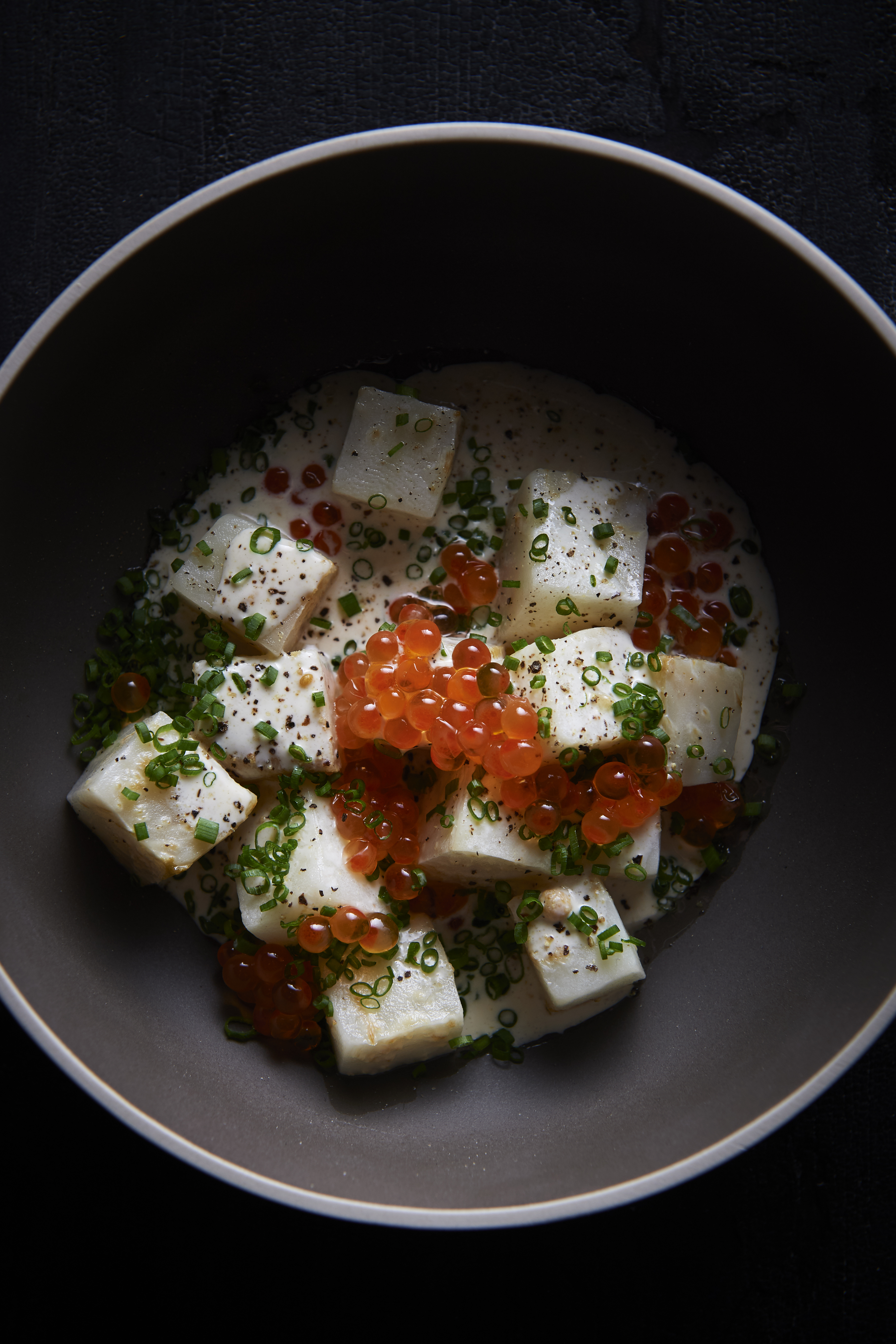 Salt-baked celeriac with mustard cream and salmon roe