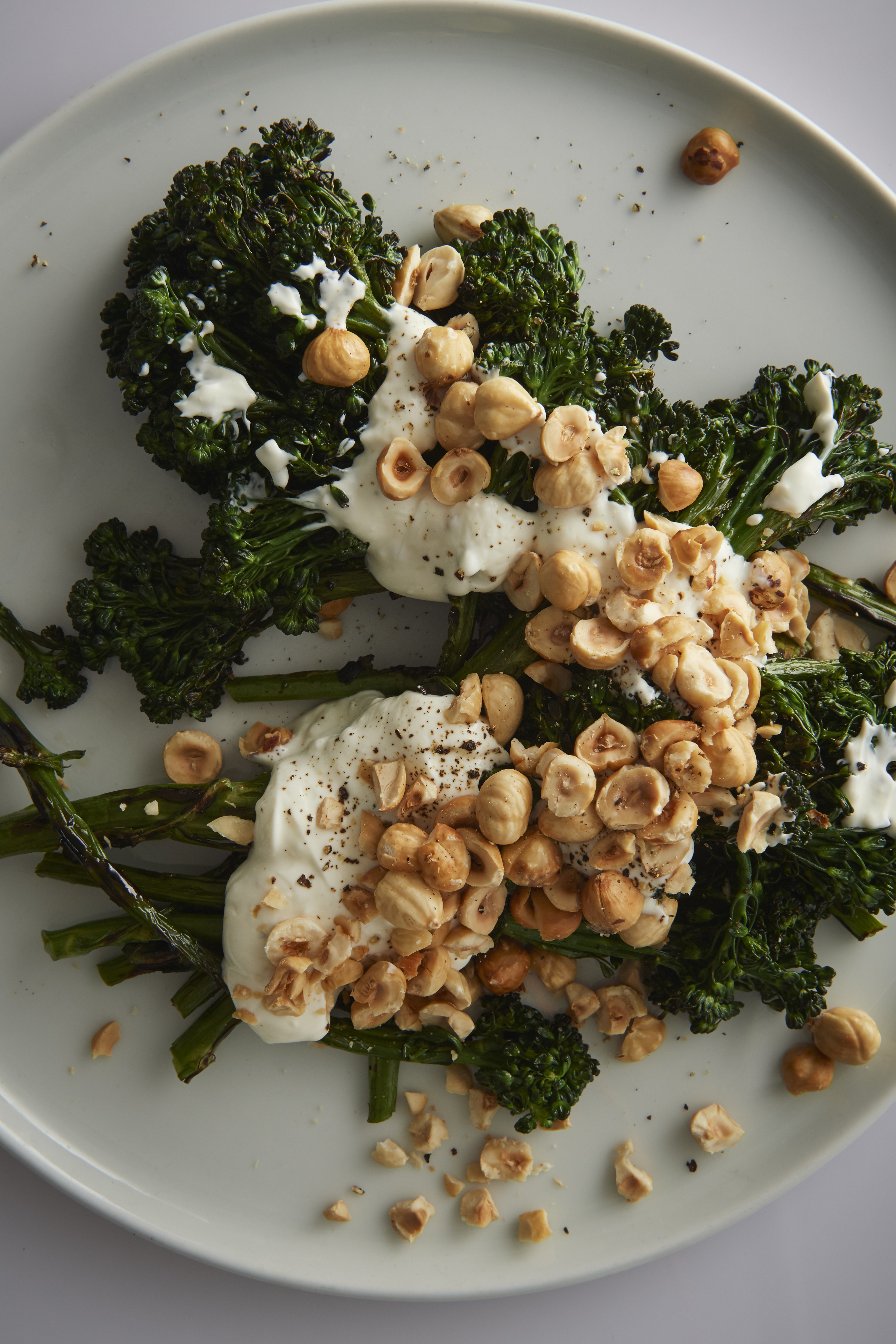 Grilled broccolini, yoghurt dressing and hazelnuts