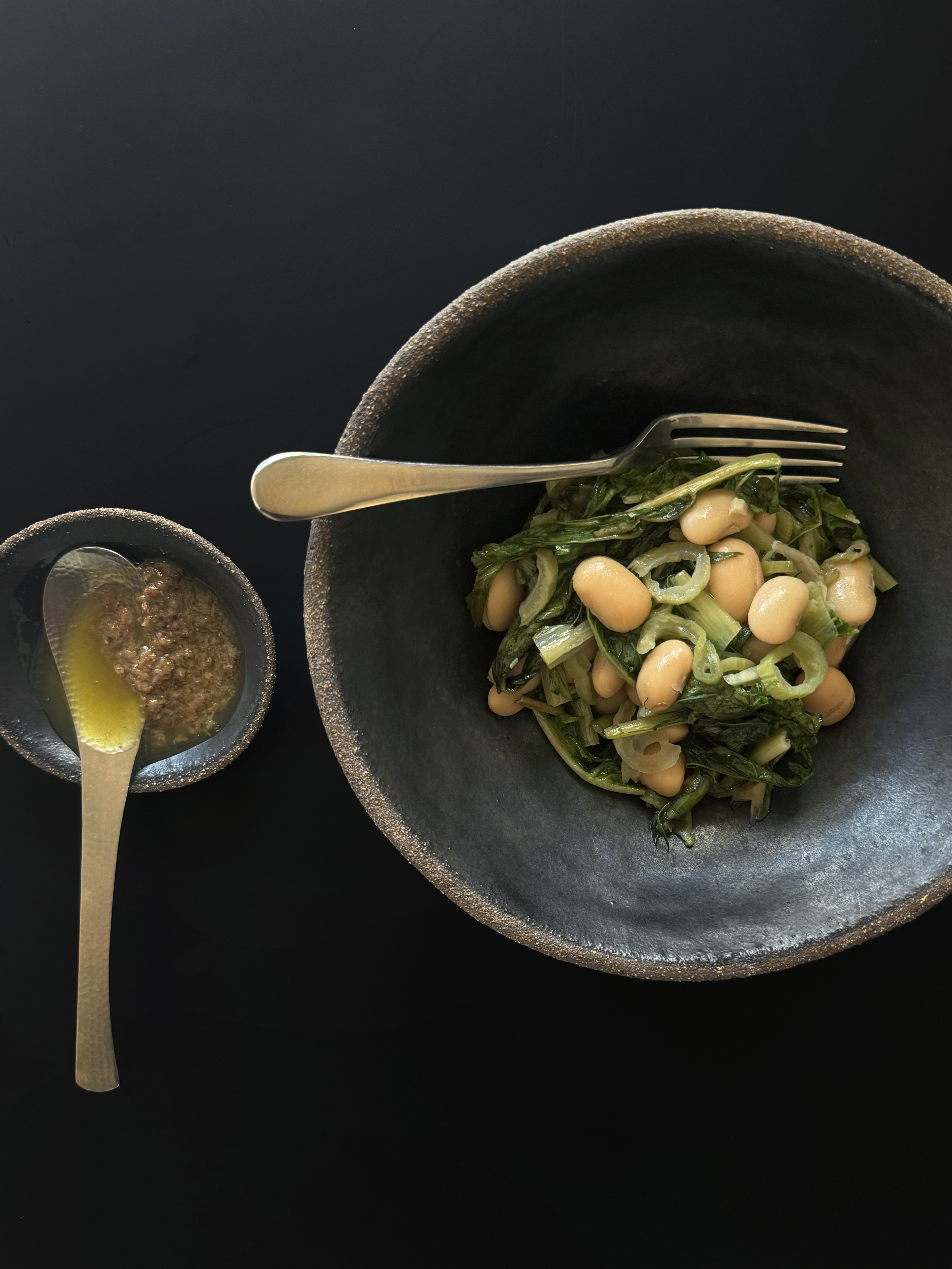 Braised chicory stems with cannellini beans and bagna càuda 