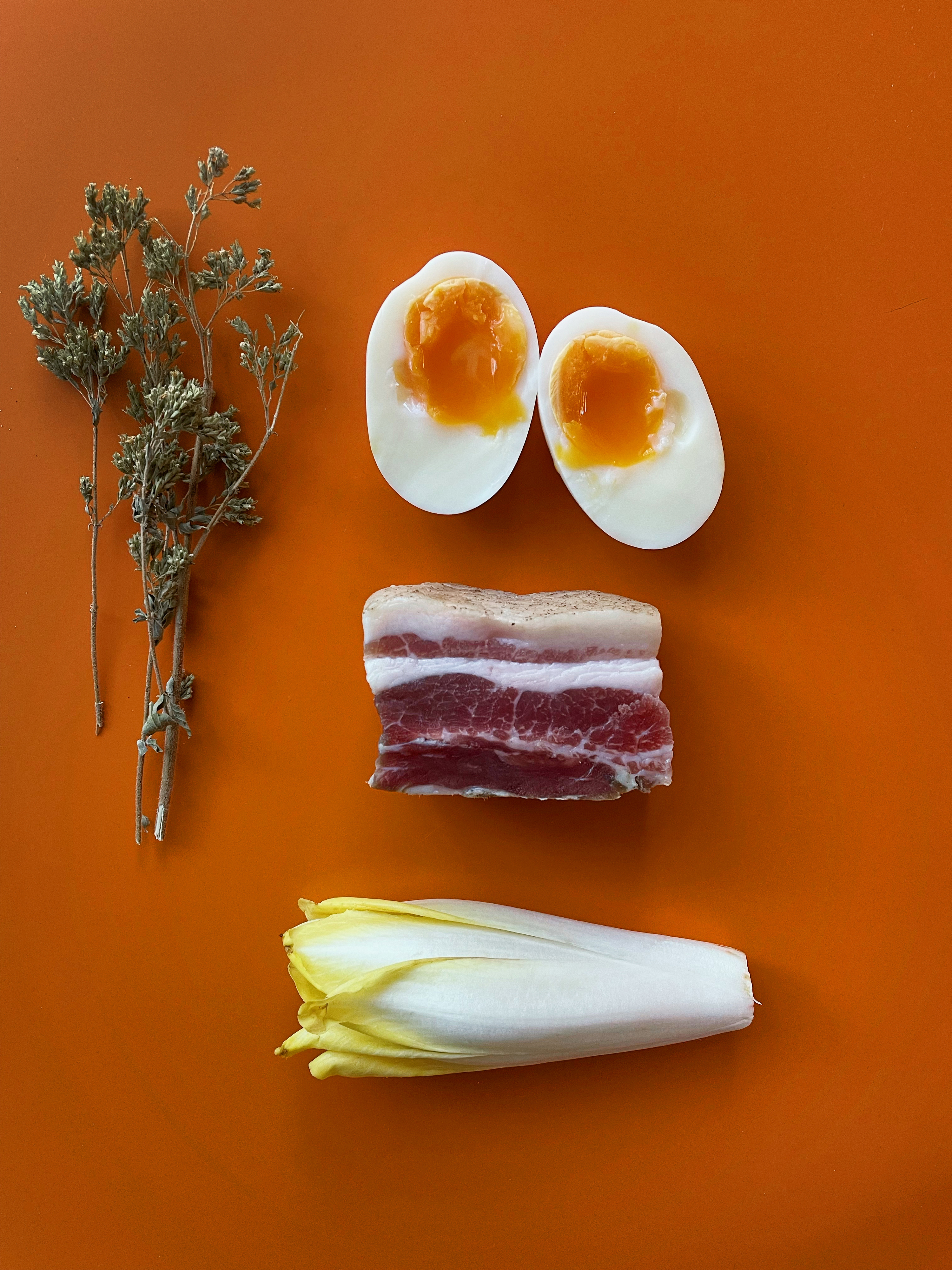 Marinated eggs with pancetta vinaigrette