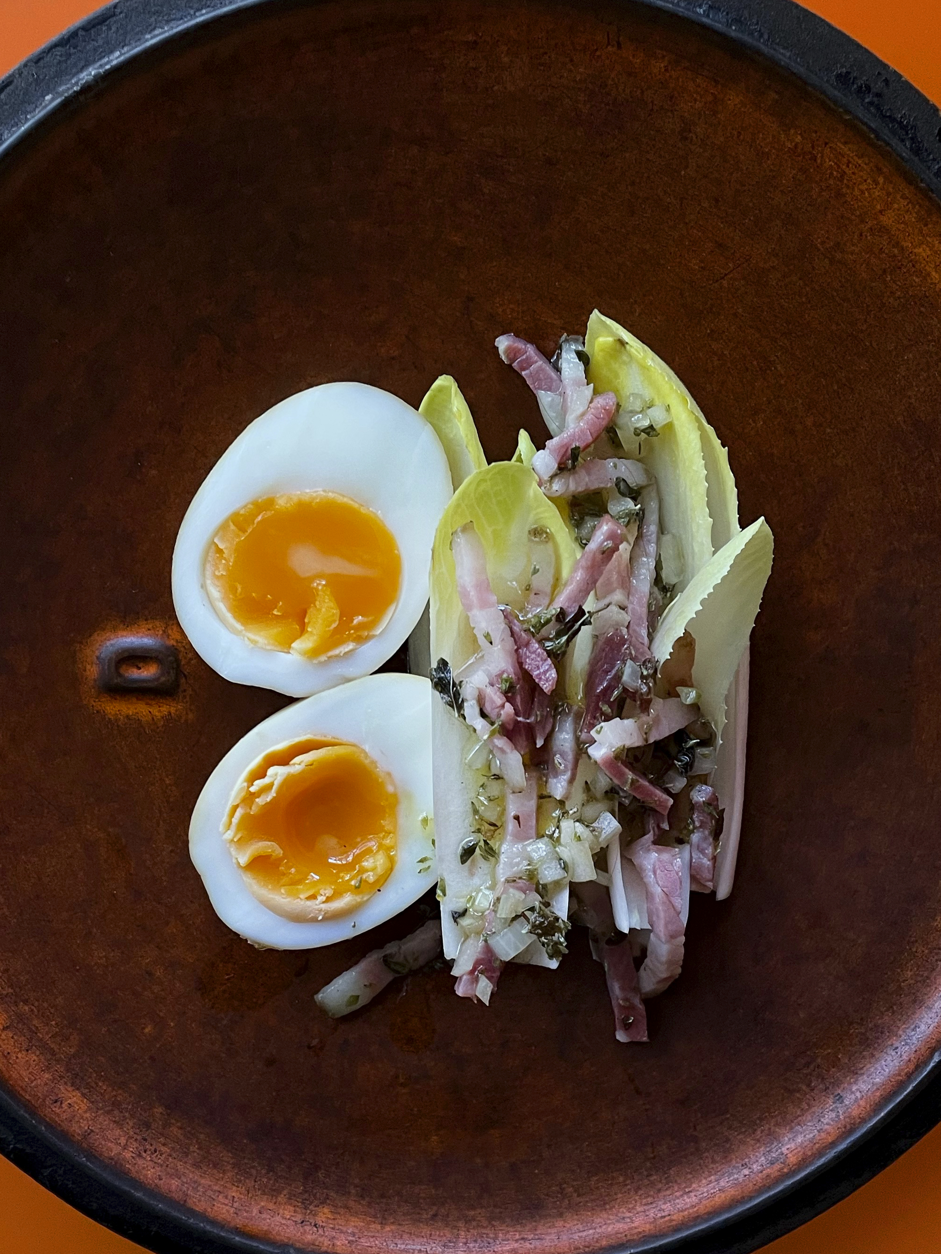 Marinated eggs with pancetta vinaigrette