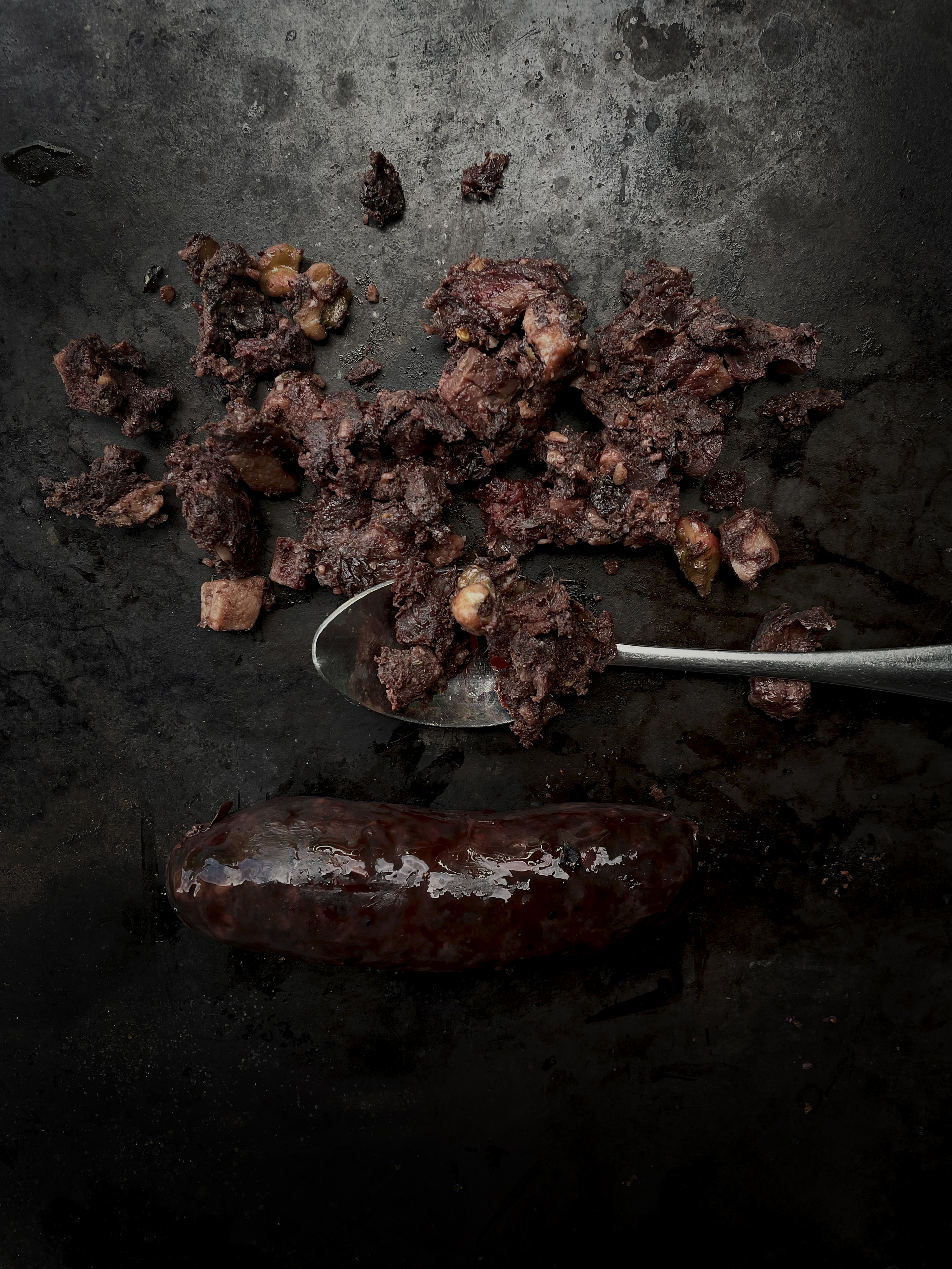 Radicchio, walnut tarator, blueberries and roasted blood sausage