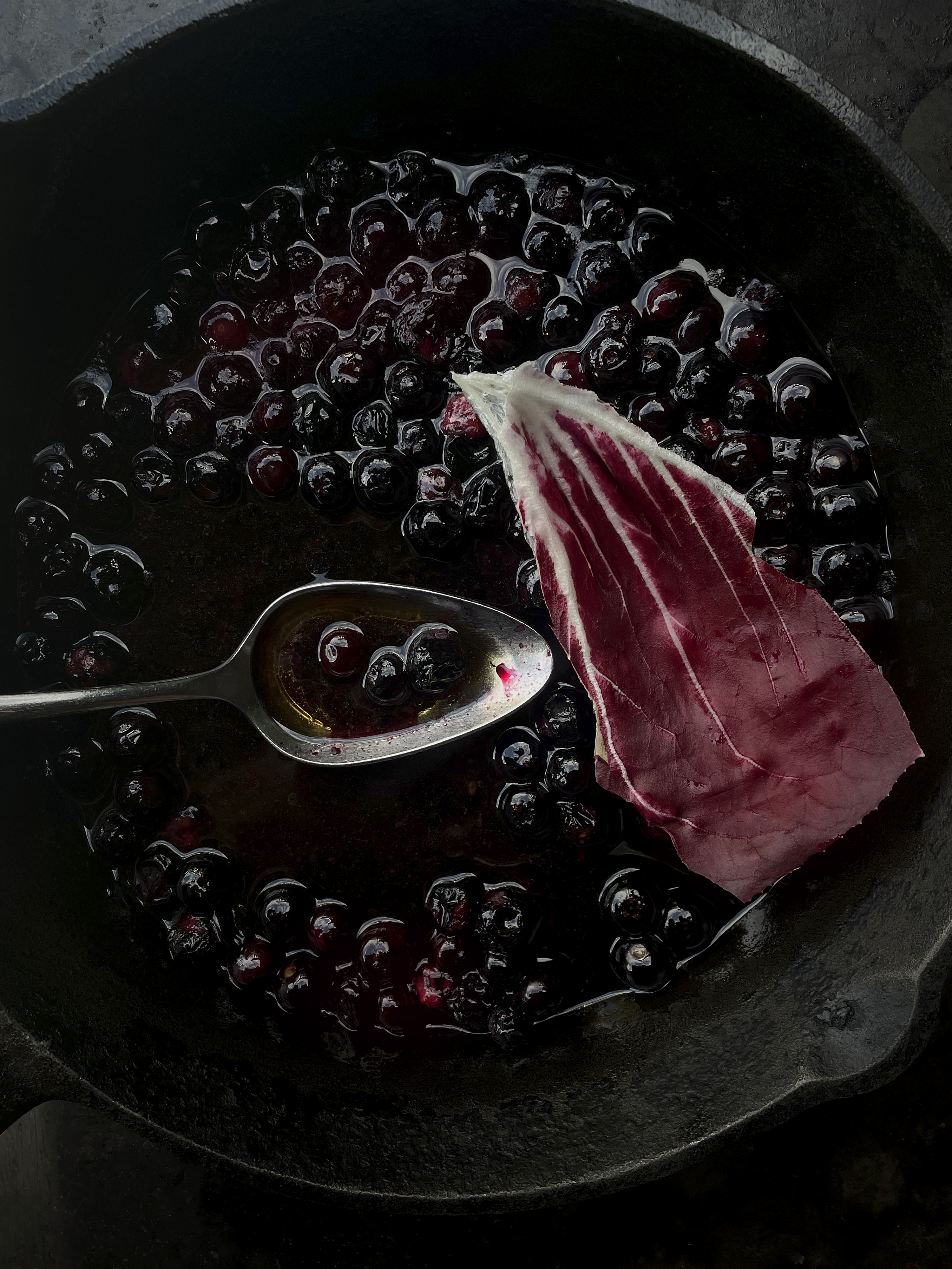 Radicchio, walnut tarator, blueberries and roasted blood sausage