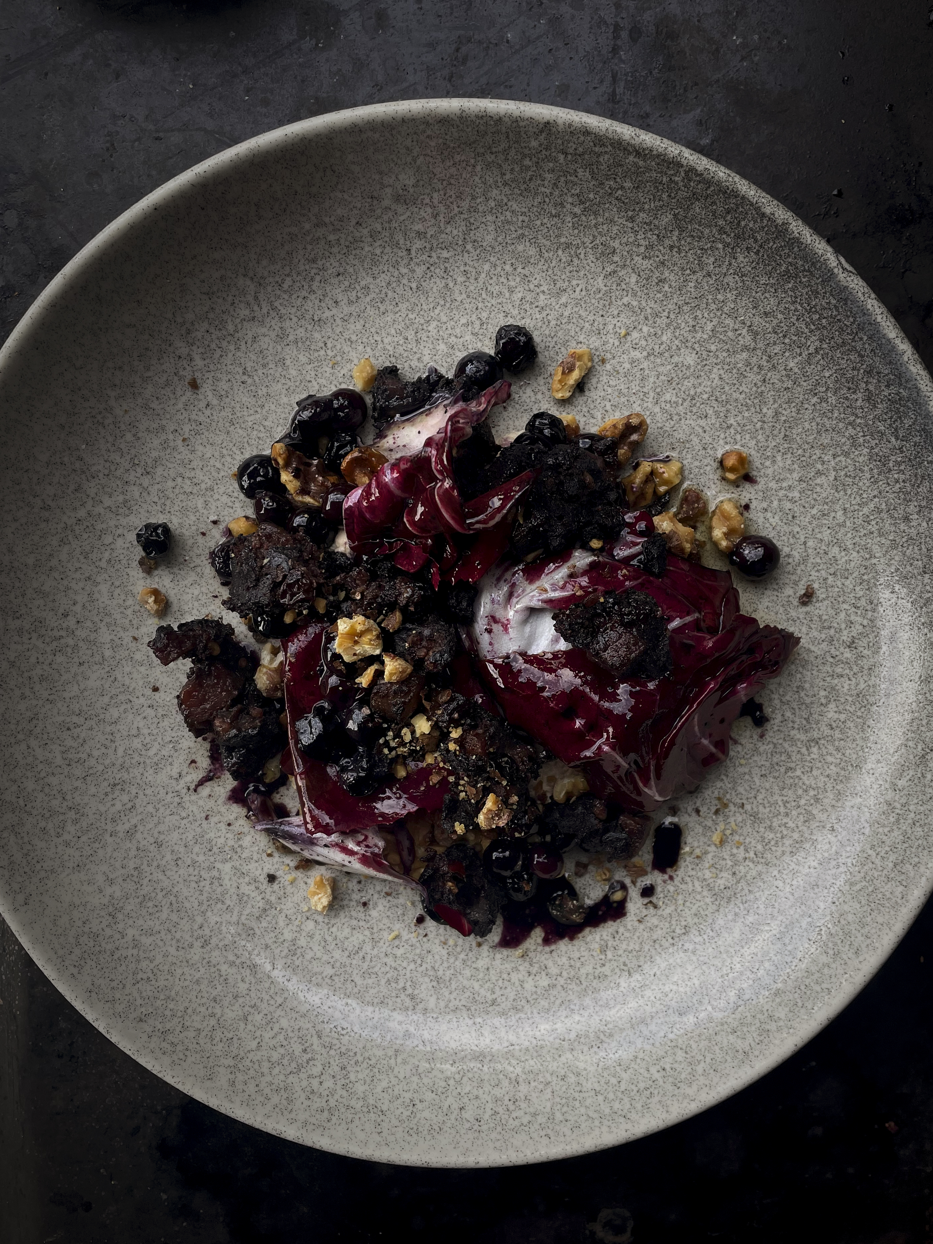 Radicchio, walnut tarator, blueberries and roasted blood sausage
