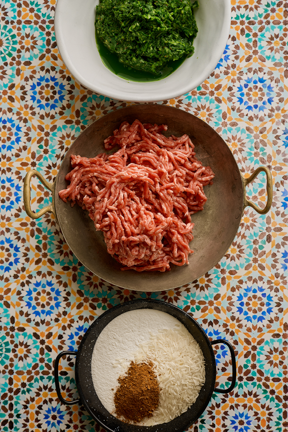 Egyptian herbed beef kofta braised  in tomato sauce