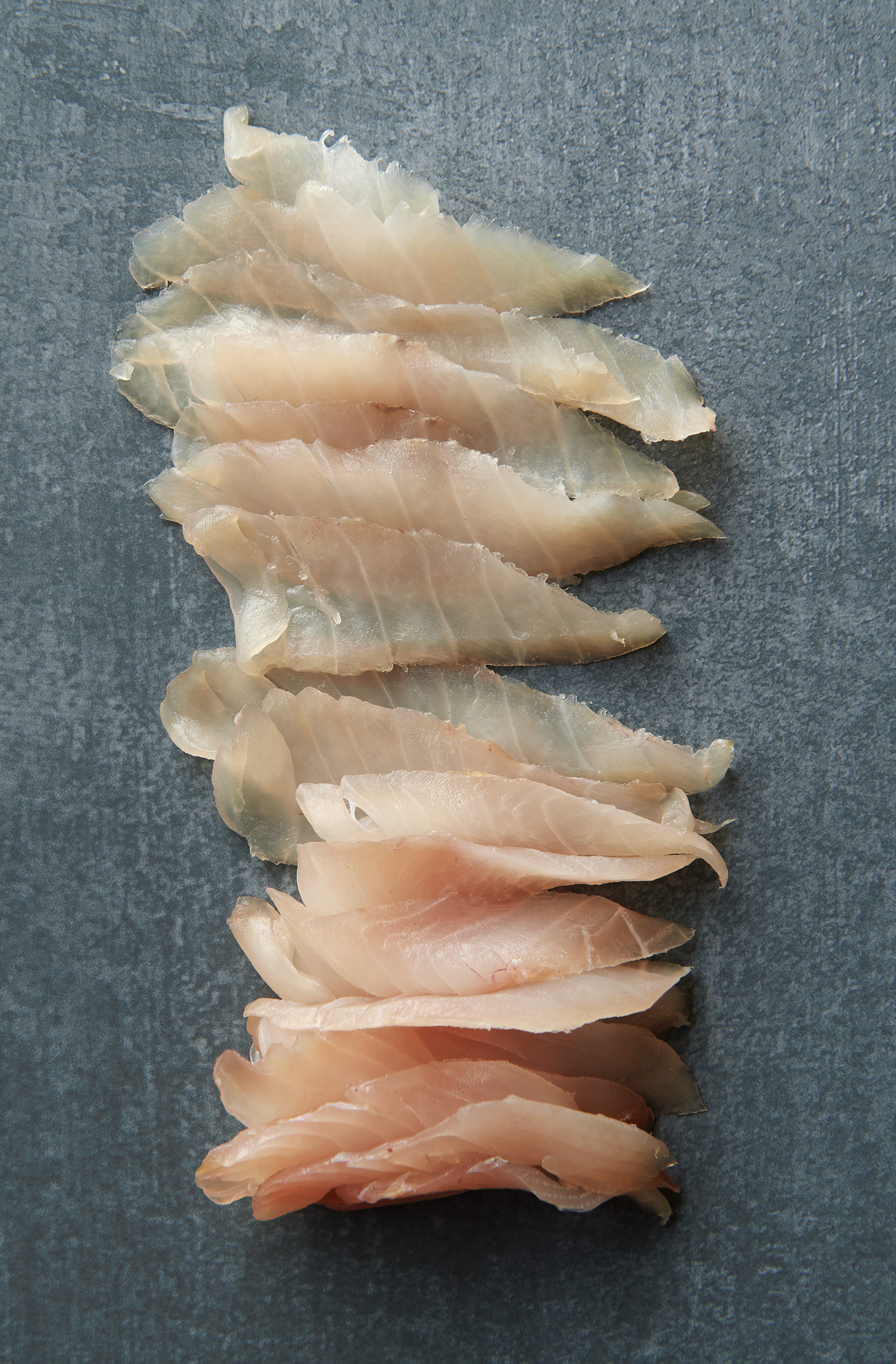 Radishes with raw silver trevally and sweet sesame