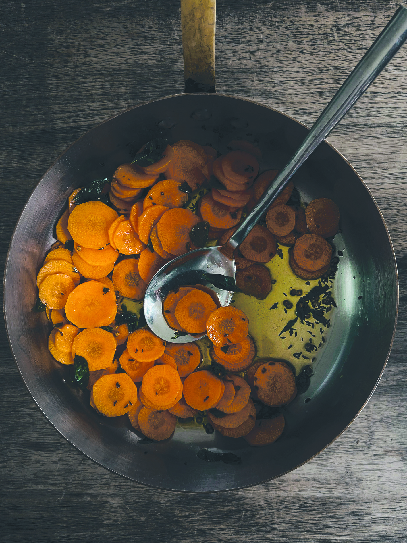 Buttered carrots with curry leaves, spices and sour yoghurt