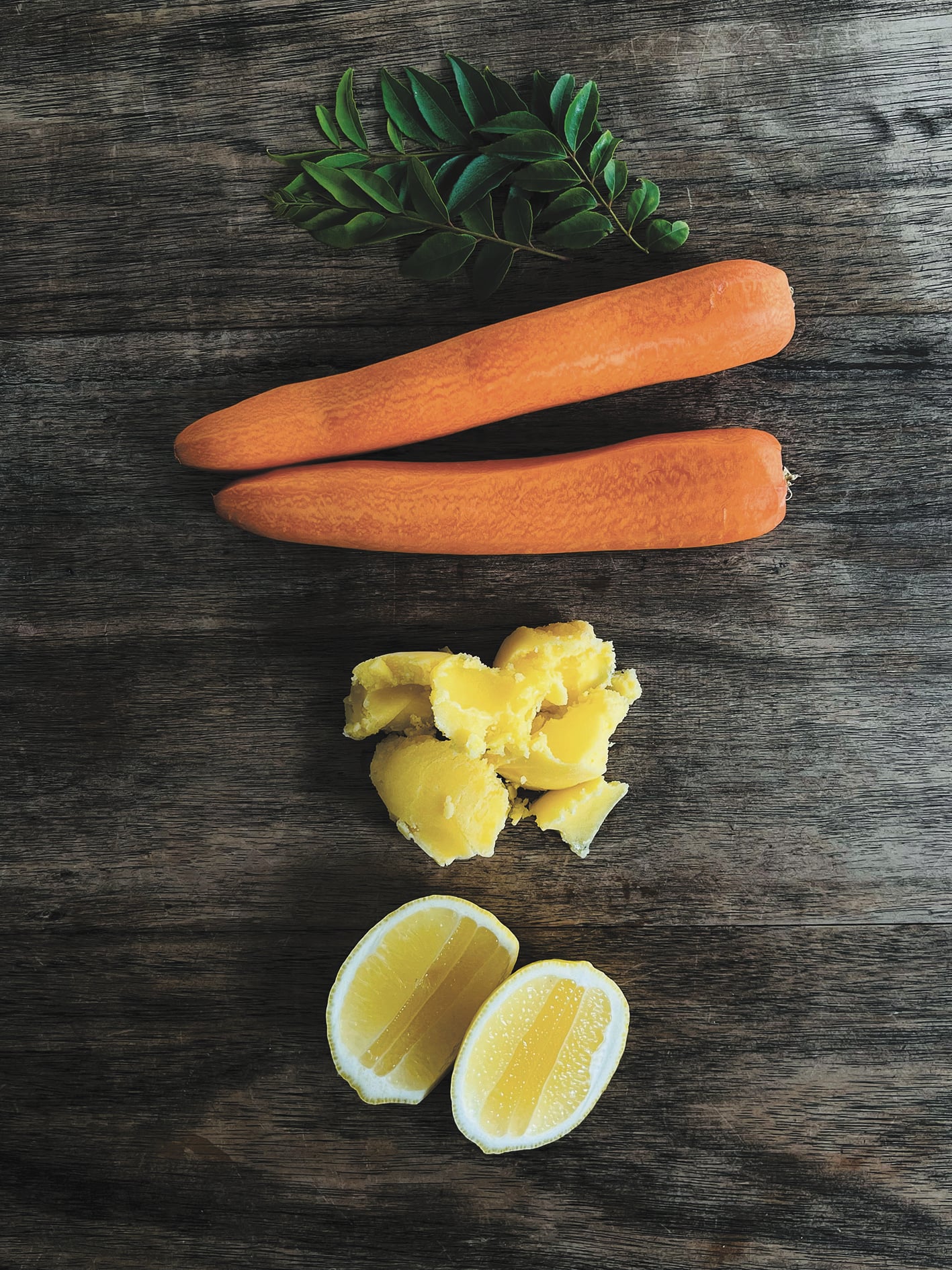 Buttered carrots with curry leaves, spices and sour yoghurt