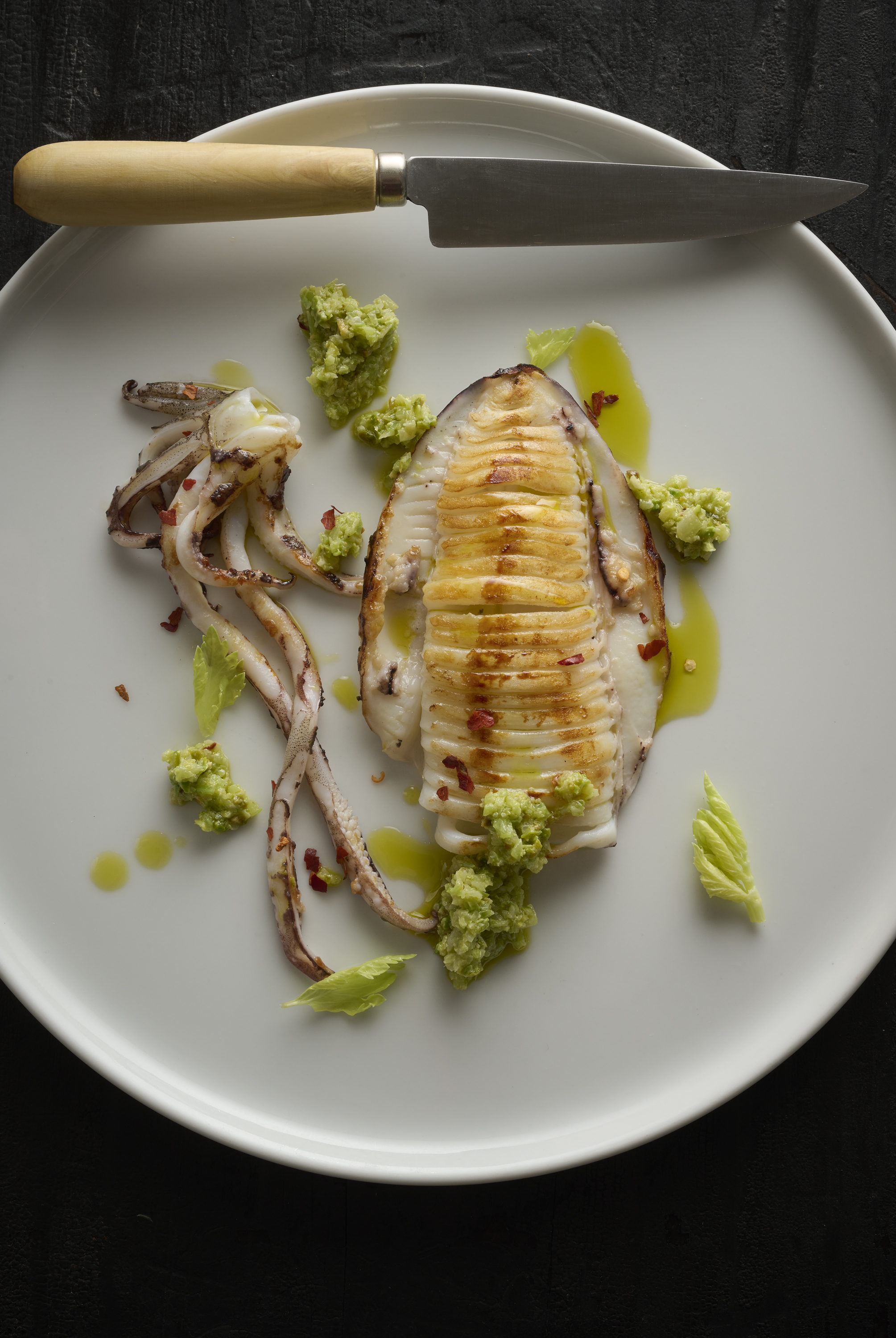 Barbecued calamari with pistachio and celery pesto