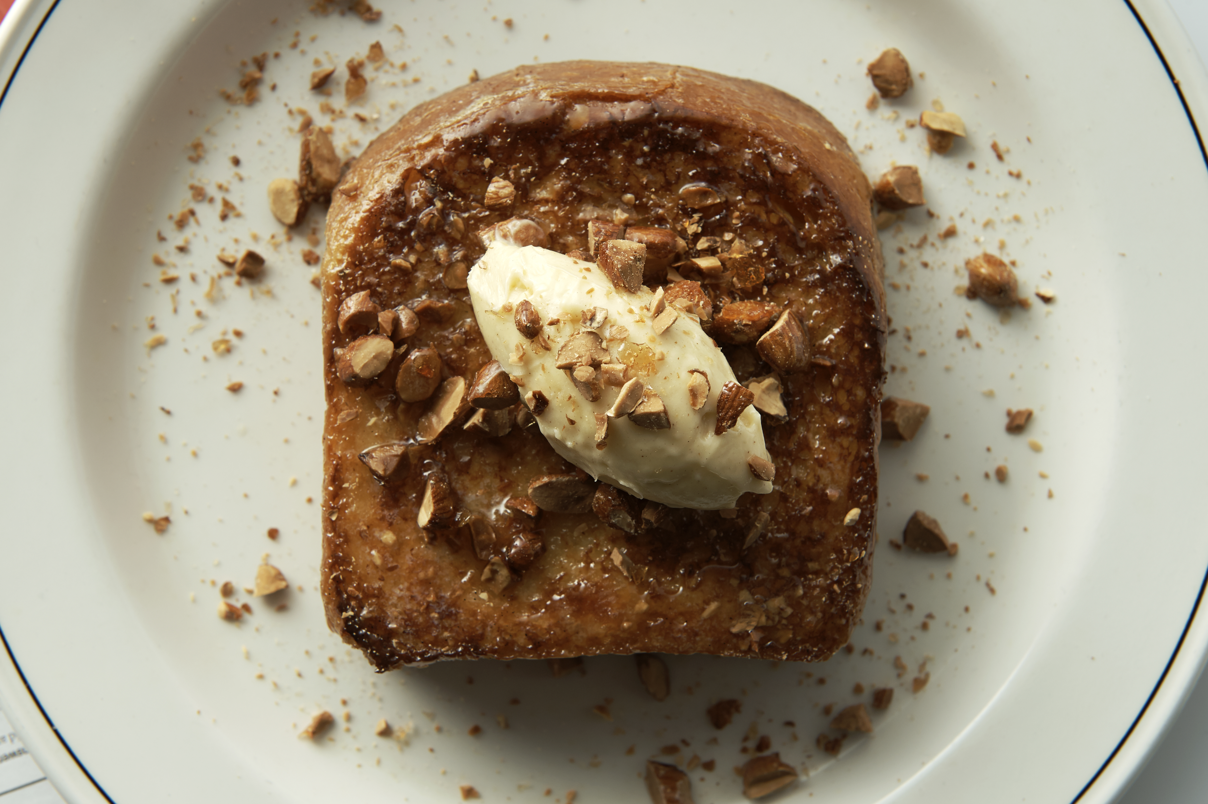 French toast with cinnamon butter and candied almonds
