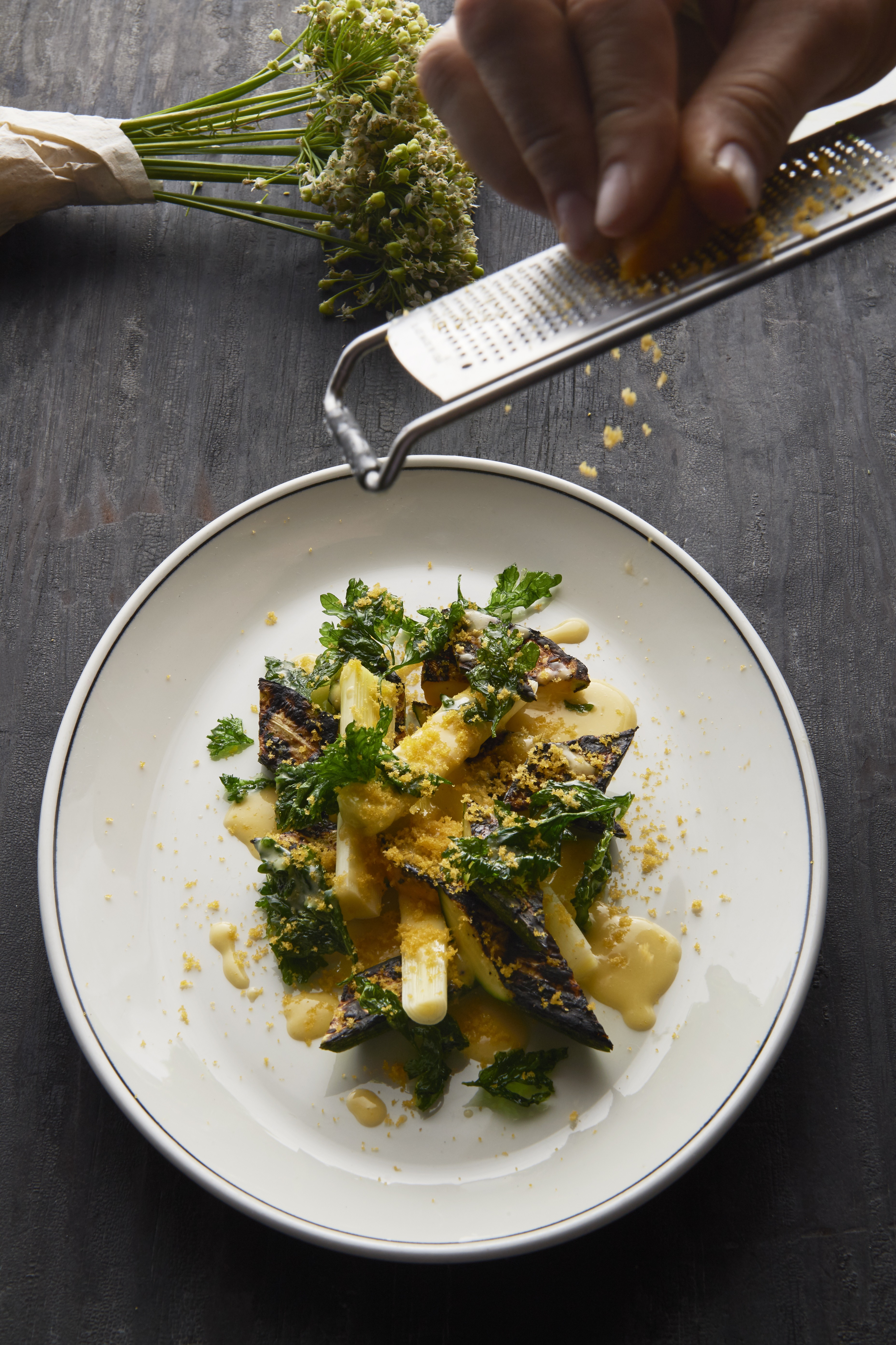 Warm salad of zucchini, leek, smoked butter and bottarga