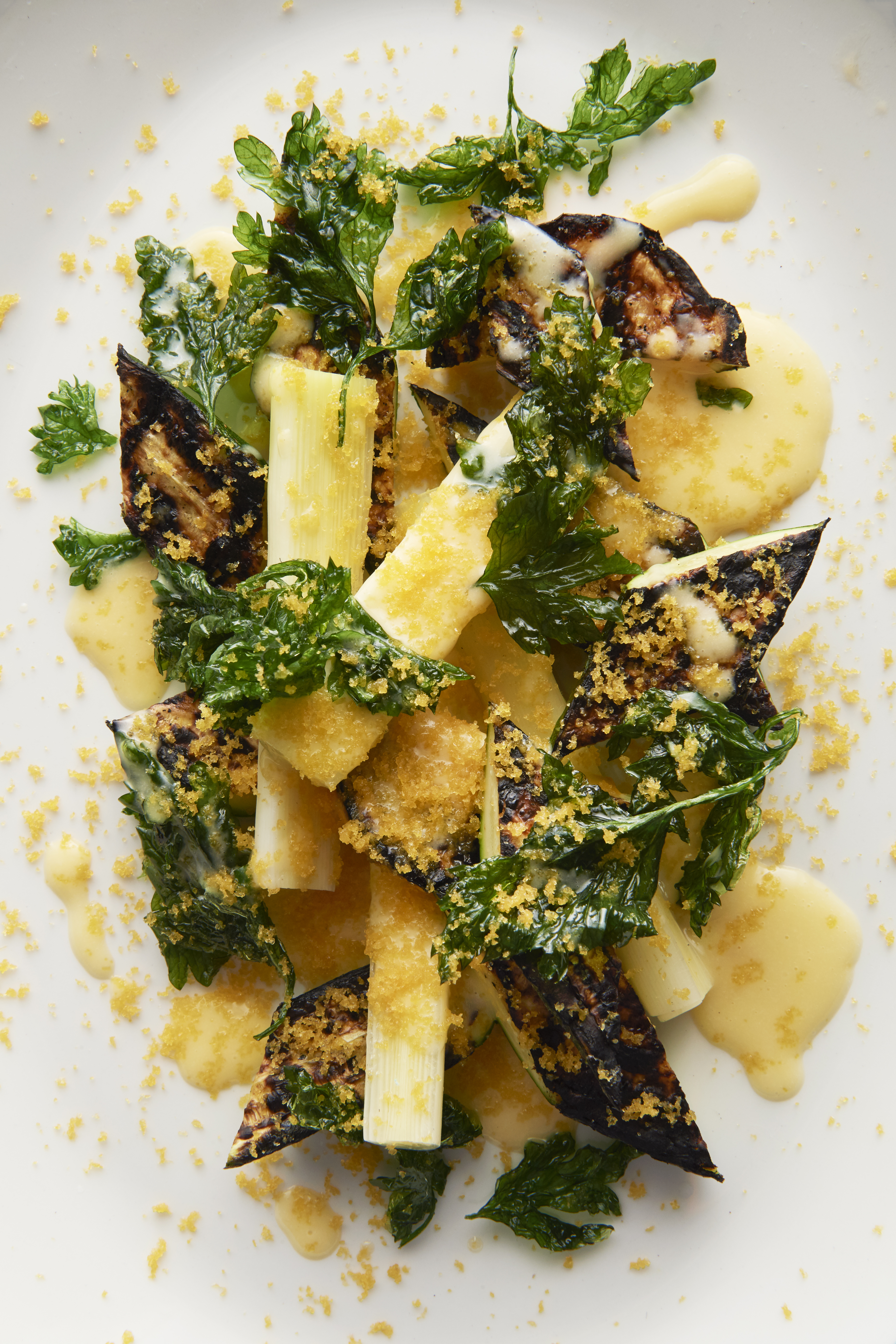 Warm salad of zucchini, leek, smoked butter and bottarga