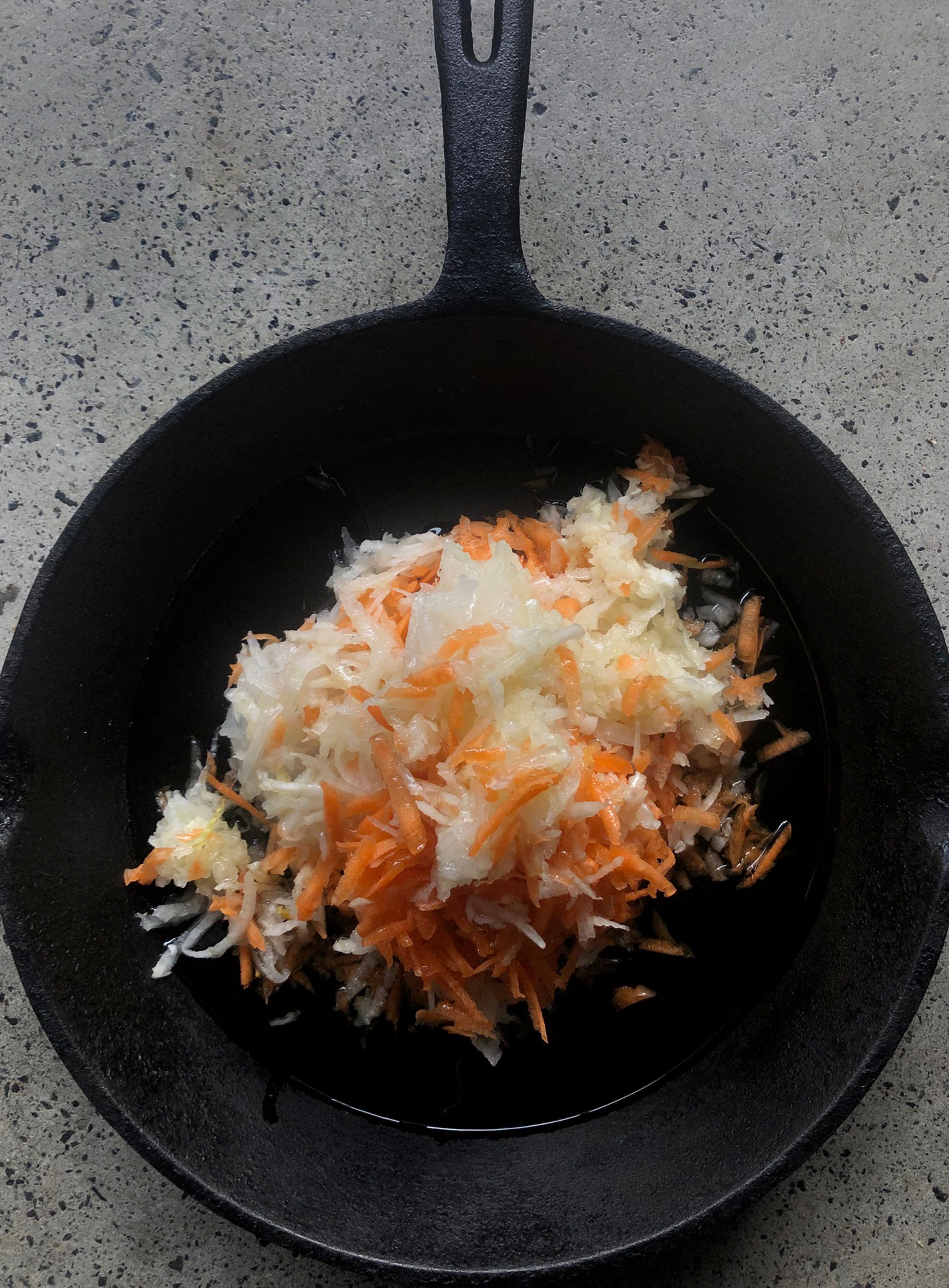 Braised root vegetables with Vegemite, brown rice and radish salad