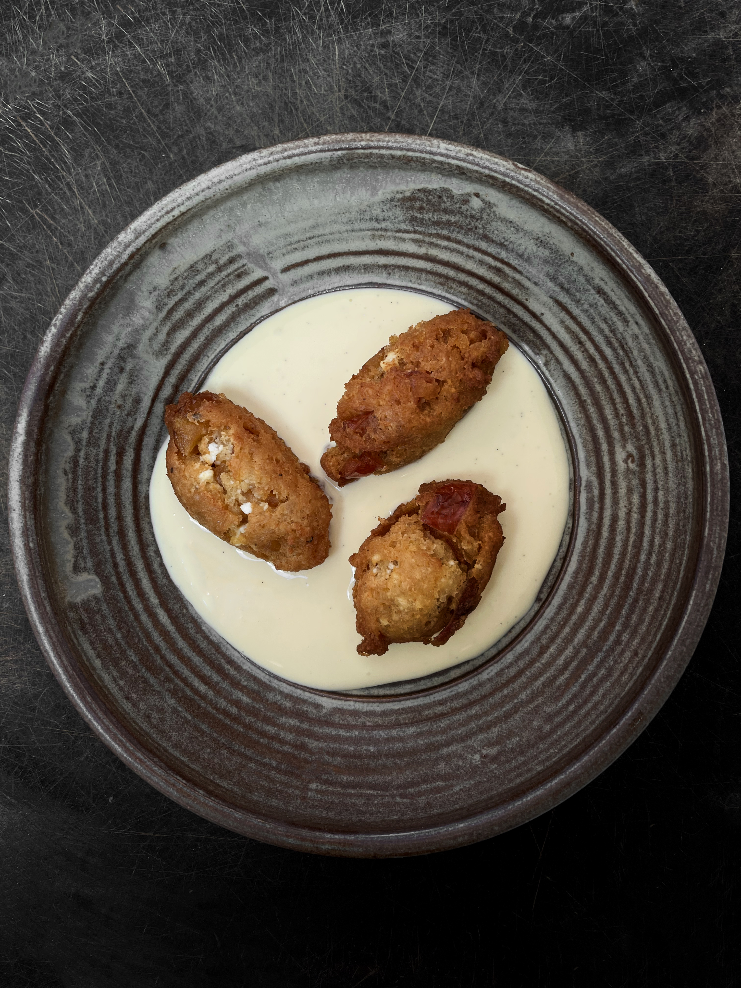 Apple fritole with calvados crème anglaise