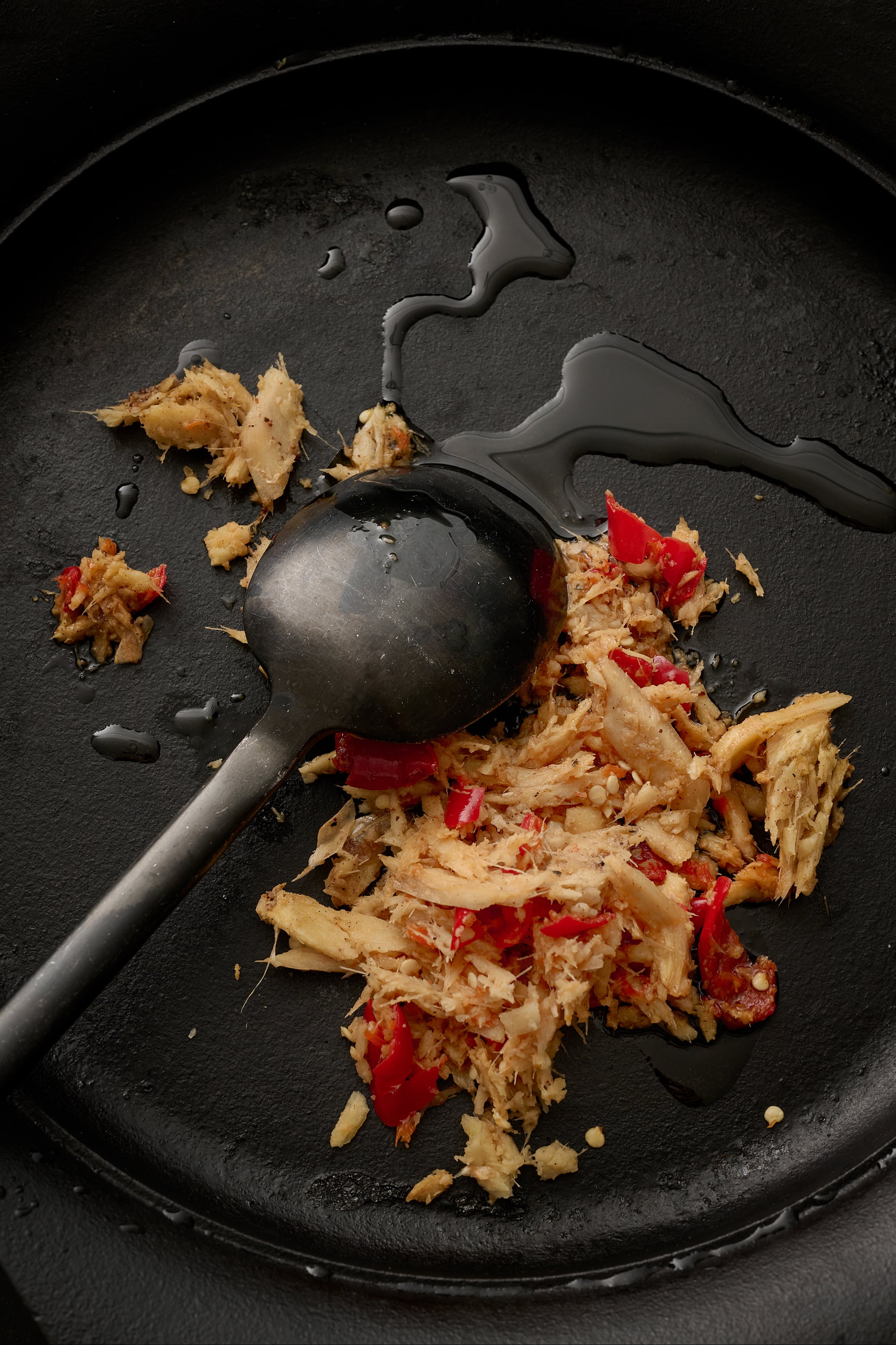Duck and chilli cooked in a pan.