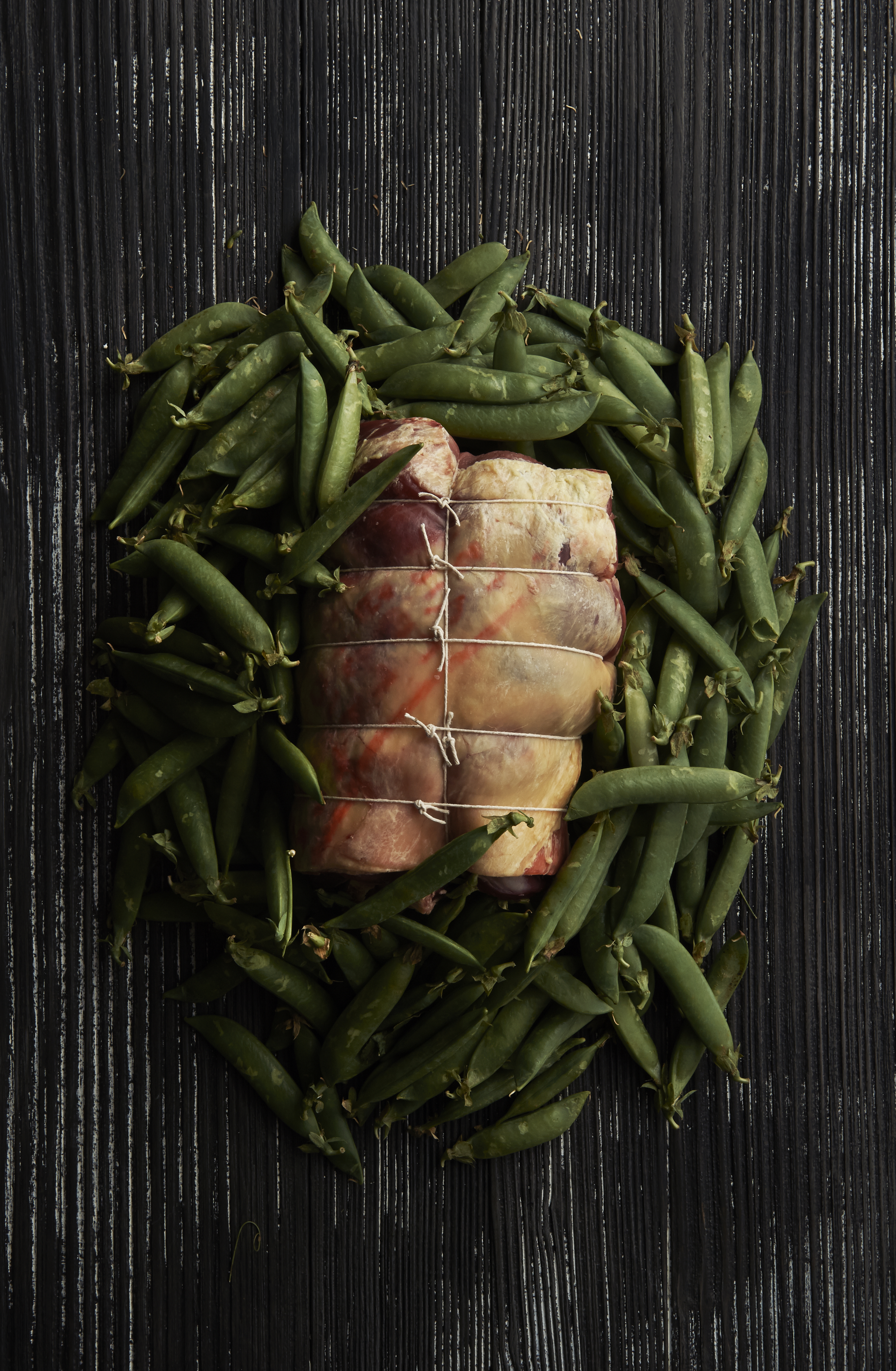 Roast lamb with crushed peas and mint sauce