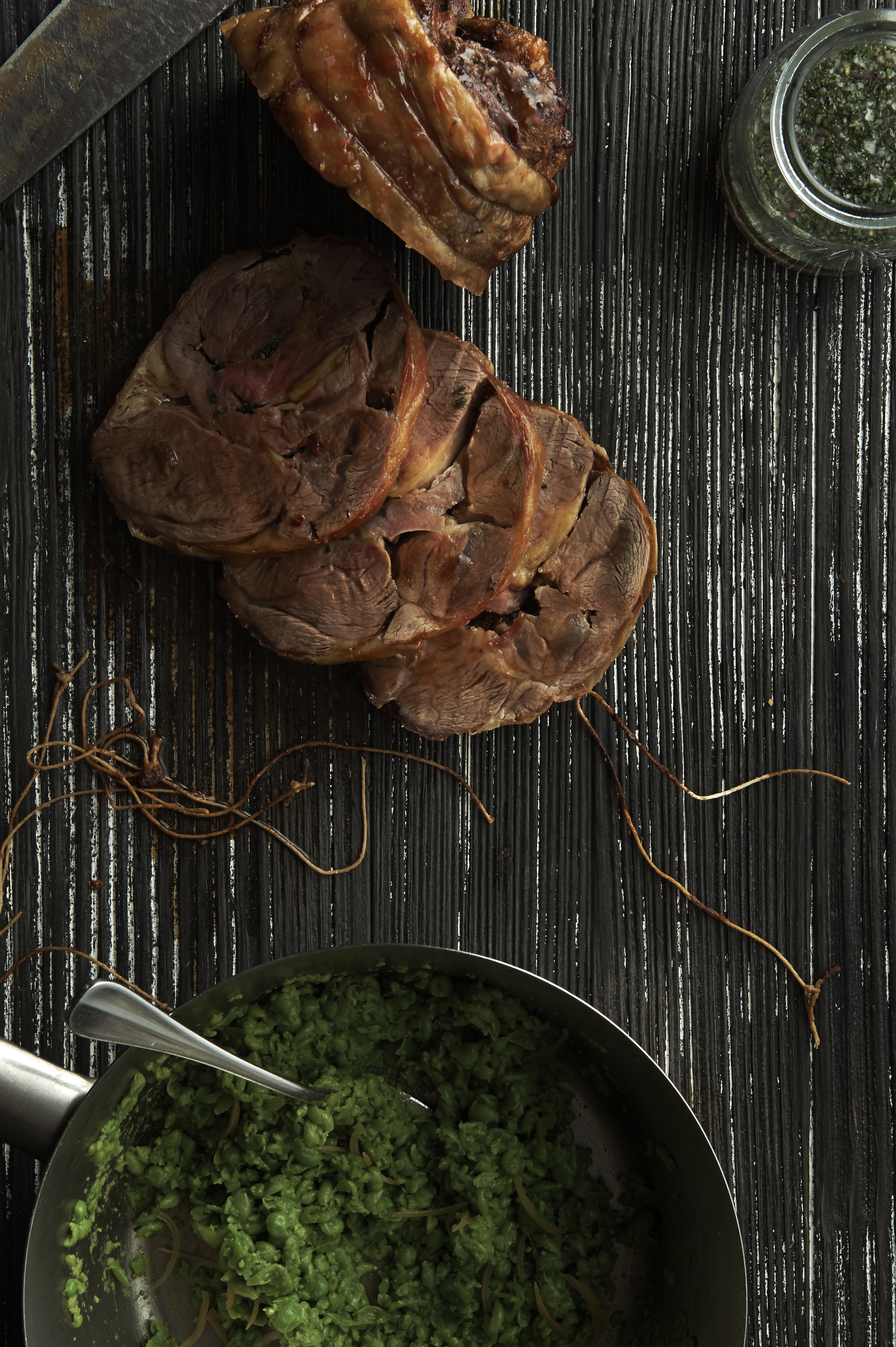 Roast lamb with crushed peas and mint sauce