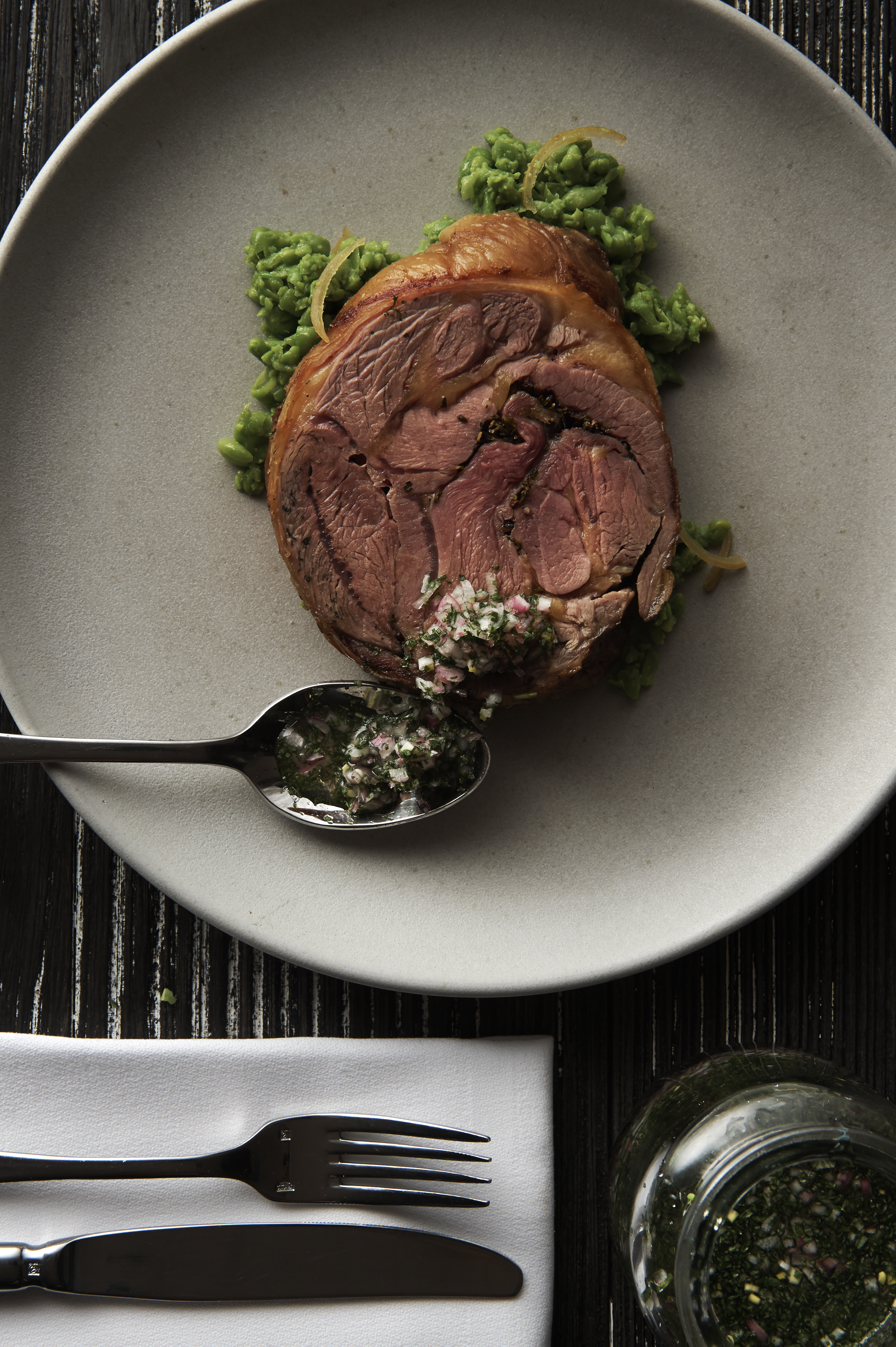 Roast lamb with crushed peas and mint sauce