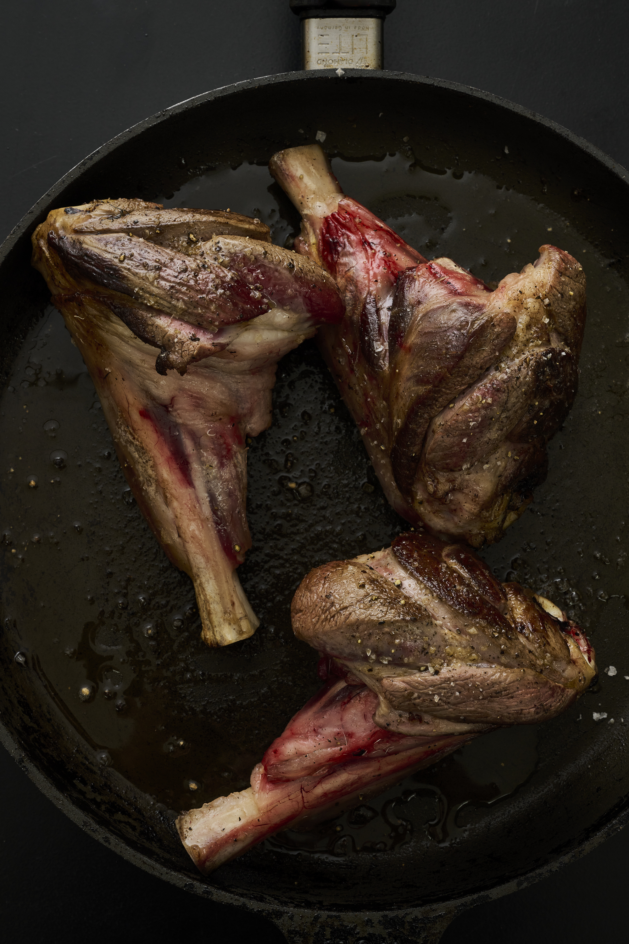 Spiced lamb shanks with quince, date molasses, carrots and dried lime