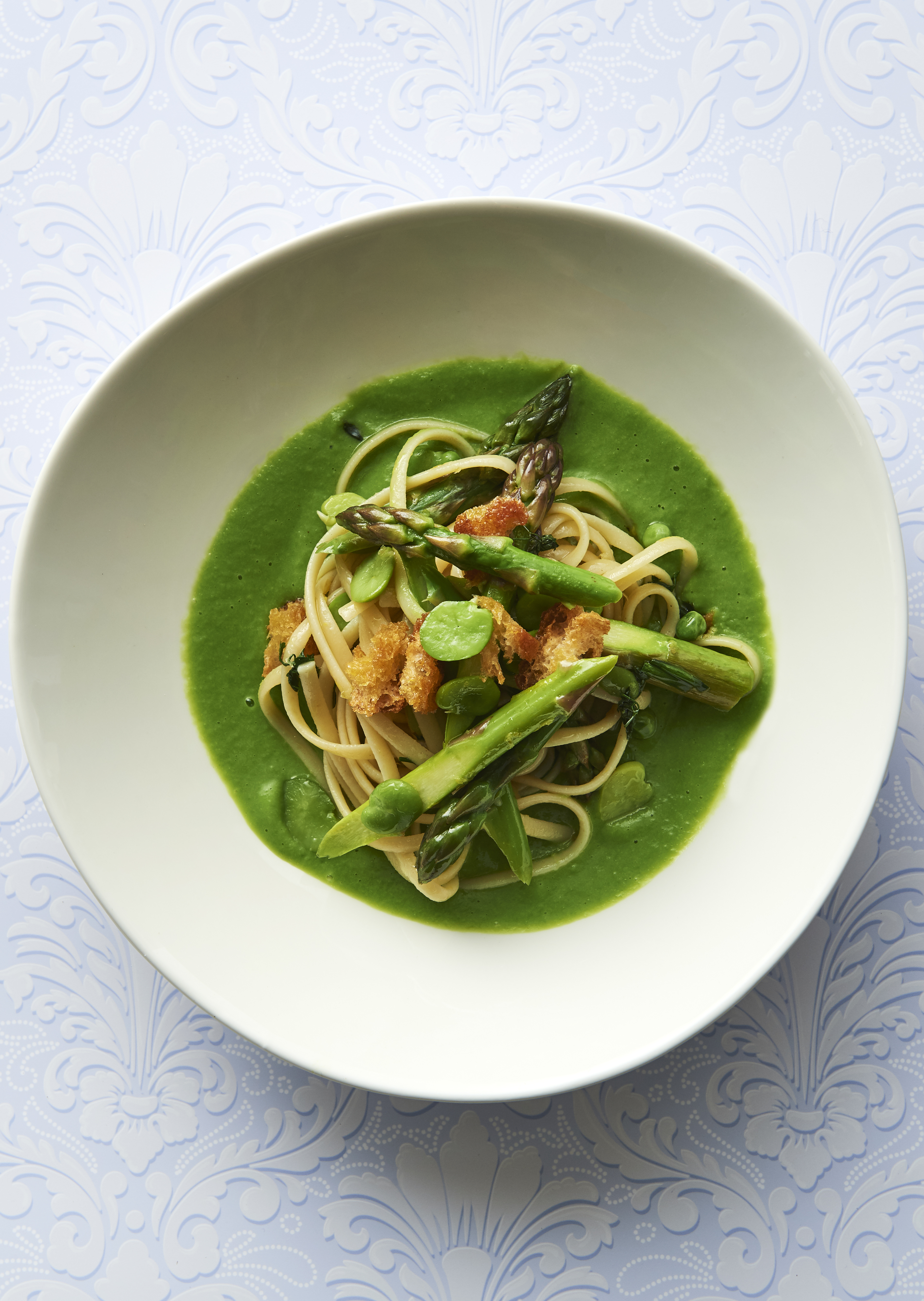 Spring linguini on pea purée