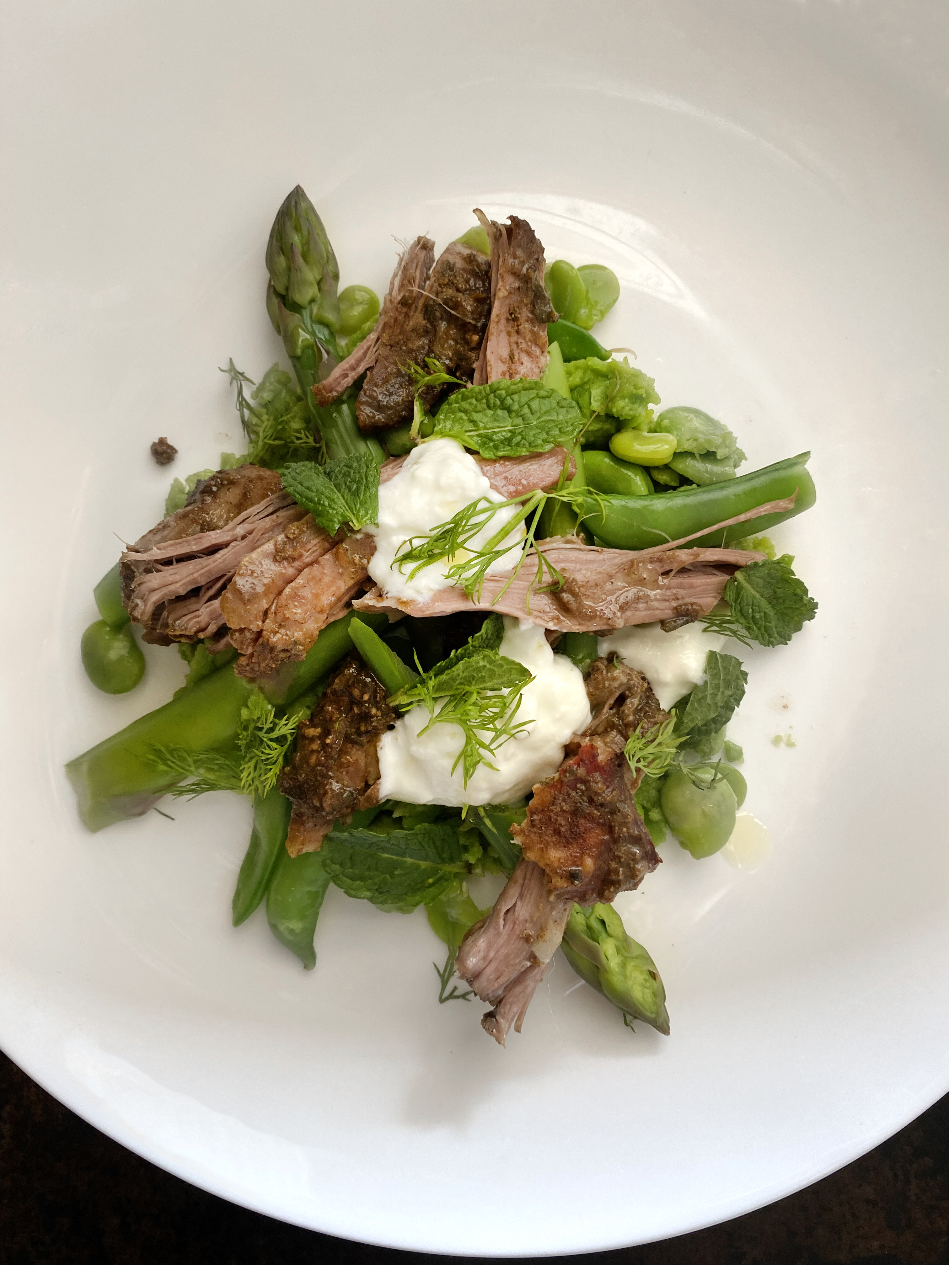Spring greens and shredded lamb shoulder