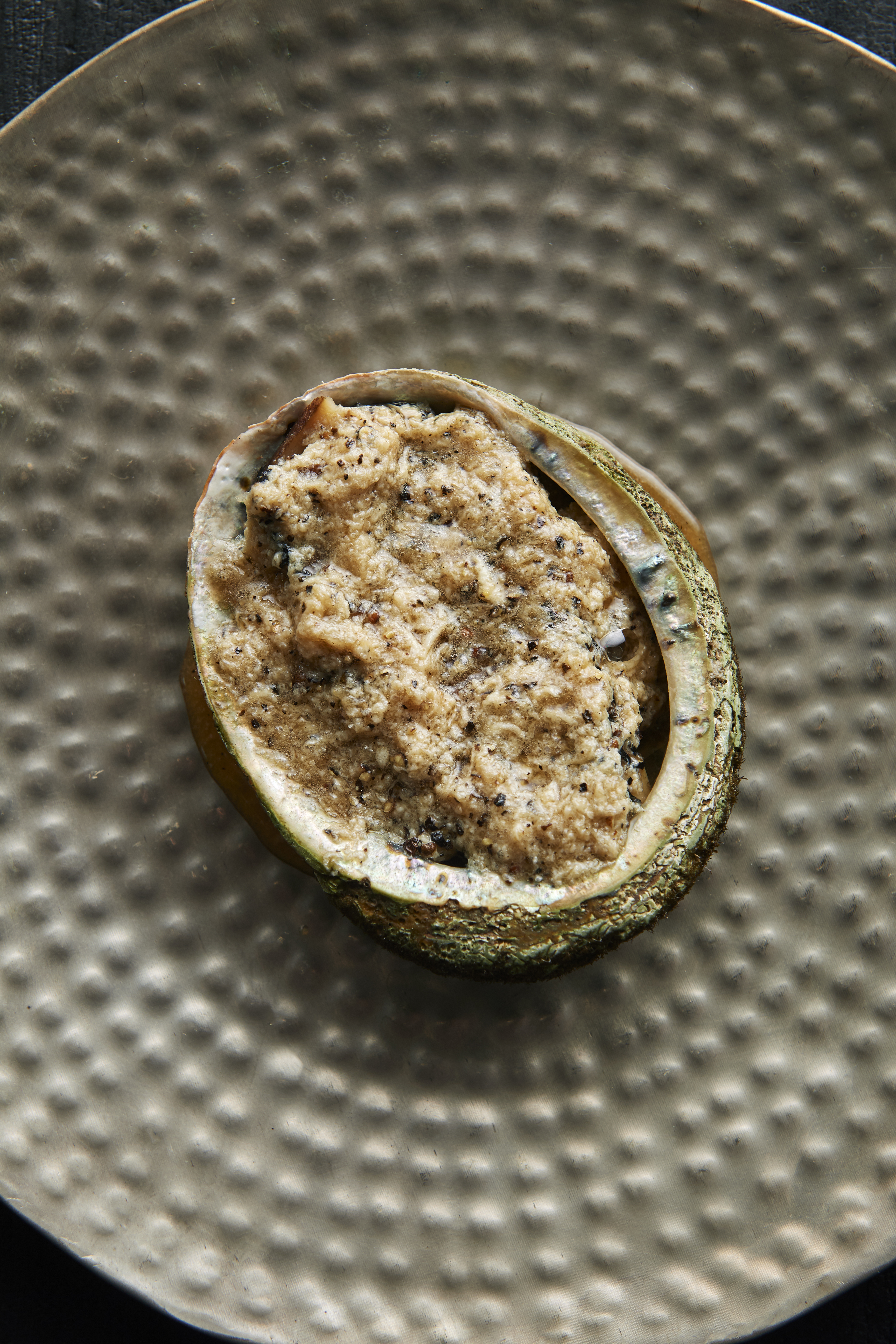 Abalone steamed in kelp with black pepper sauce