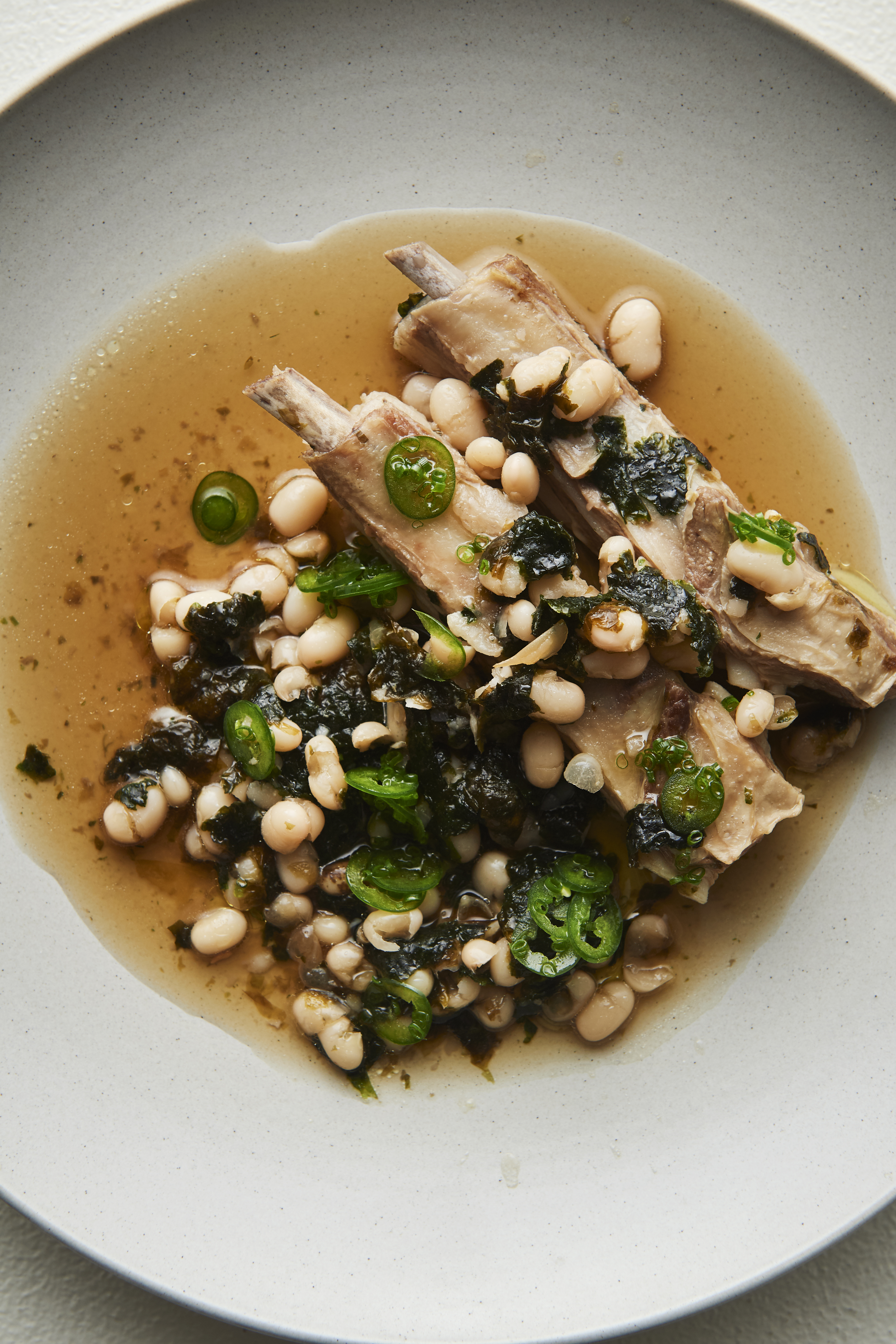 White beans with lamb ribs and green goddess sauce