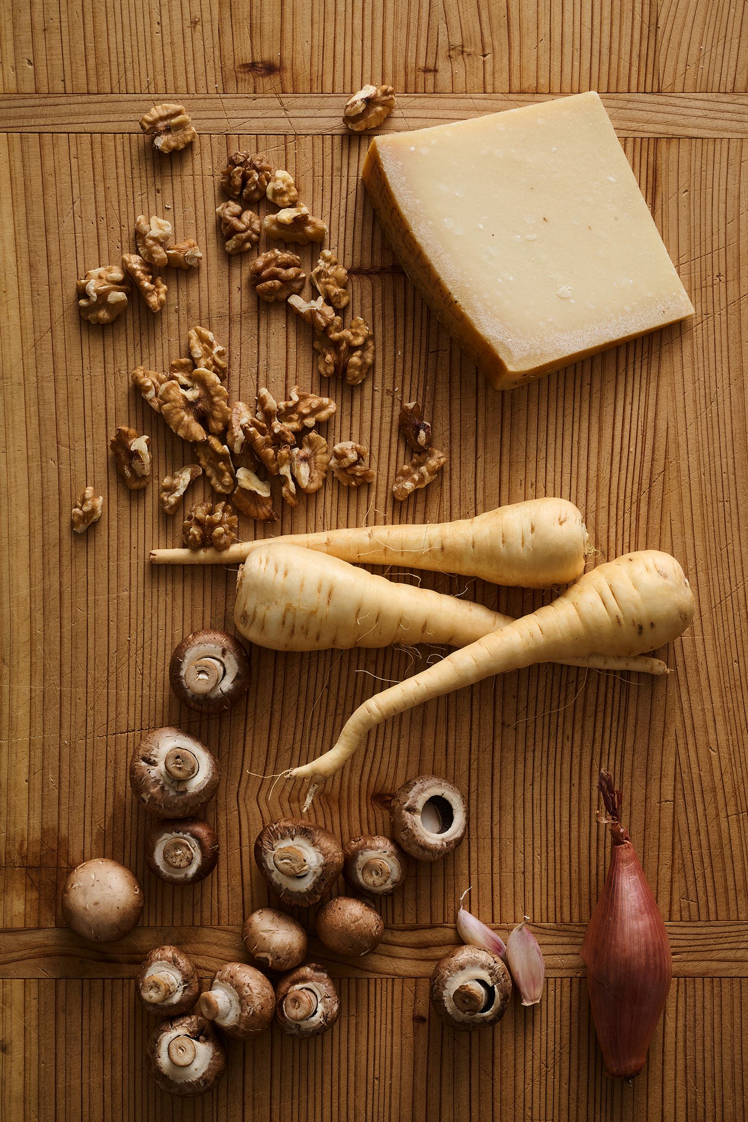 vegetables, walnuts and cheese spread across a table
