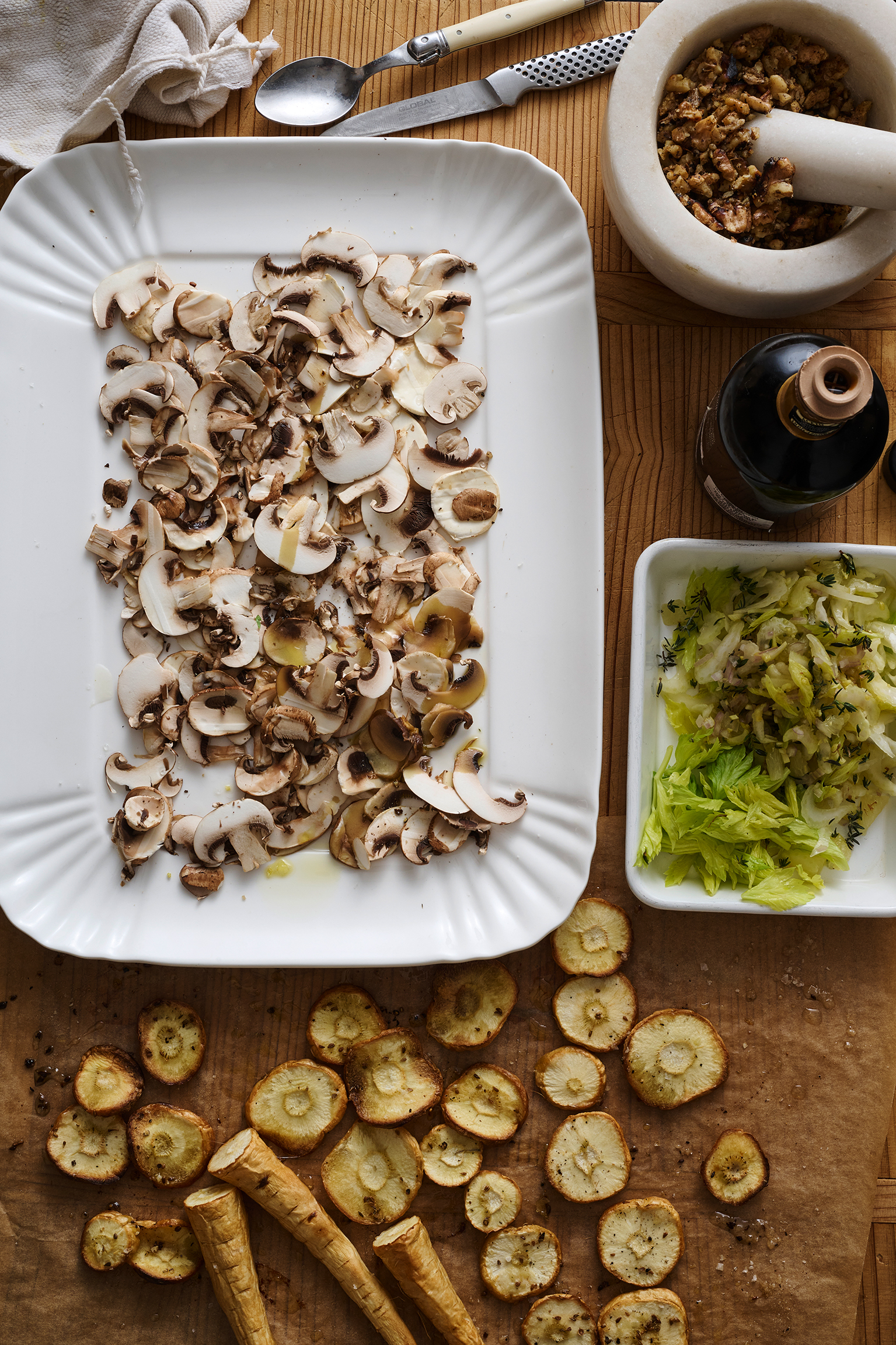 Ingredients for fungi salad with celery, walnuts  and parsnip 