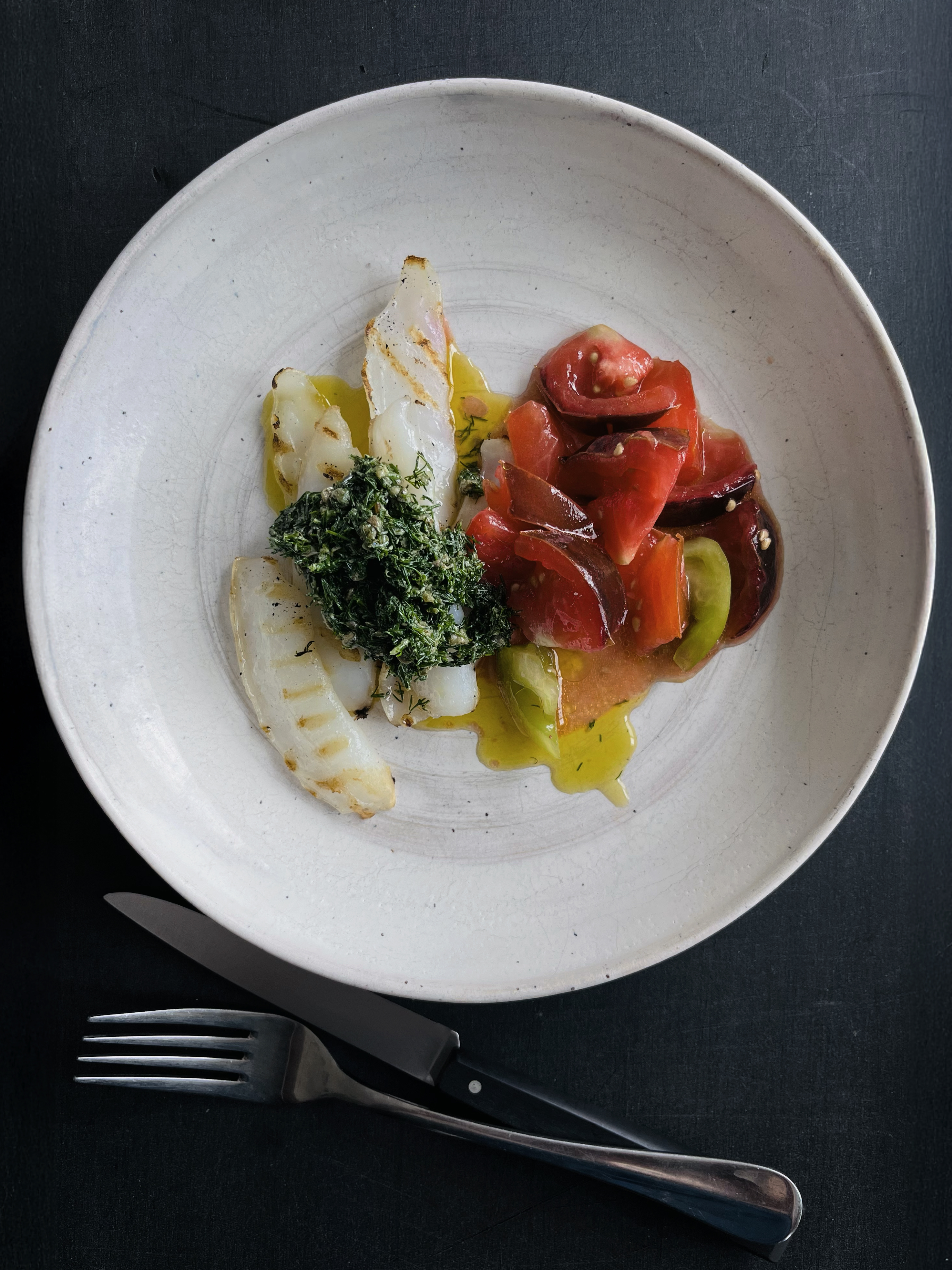 Dill sauce and tomato salad