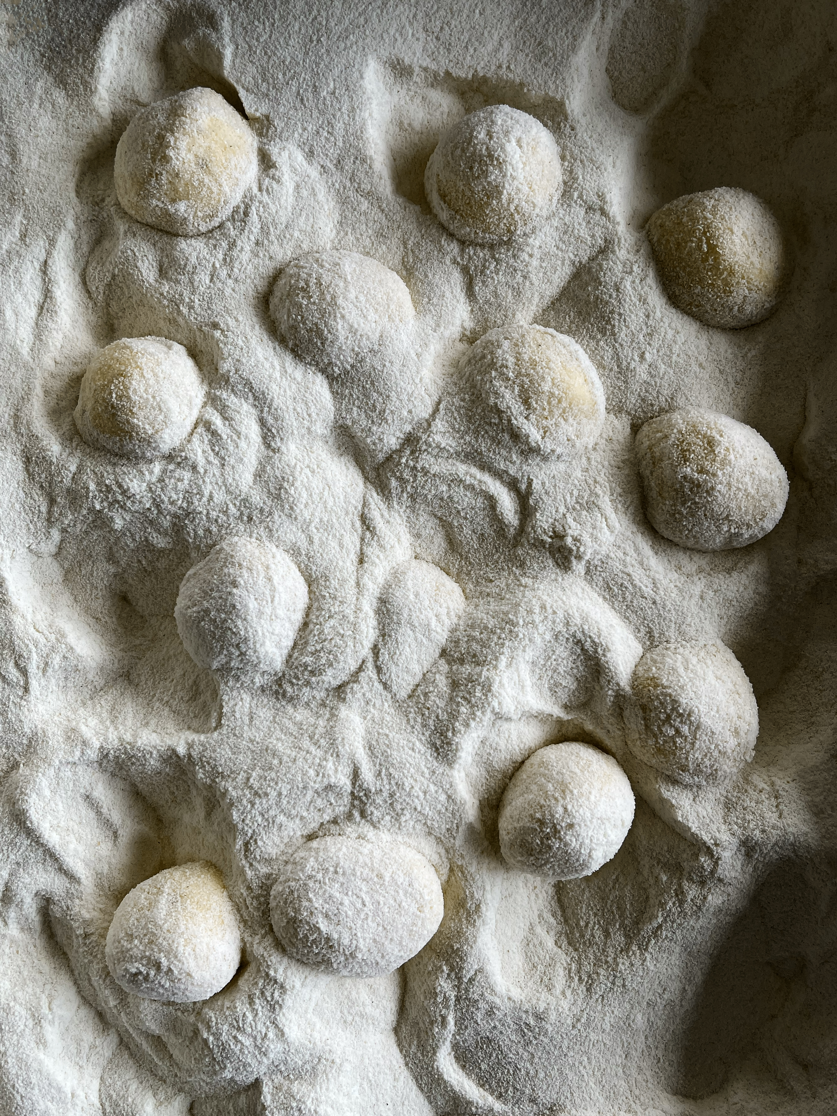 Ricotta gnudi with asparagus and anchovy