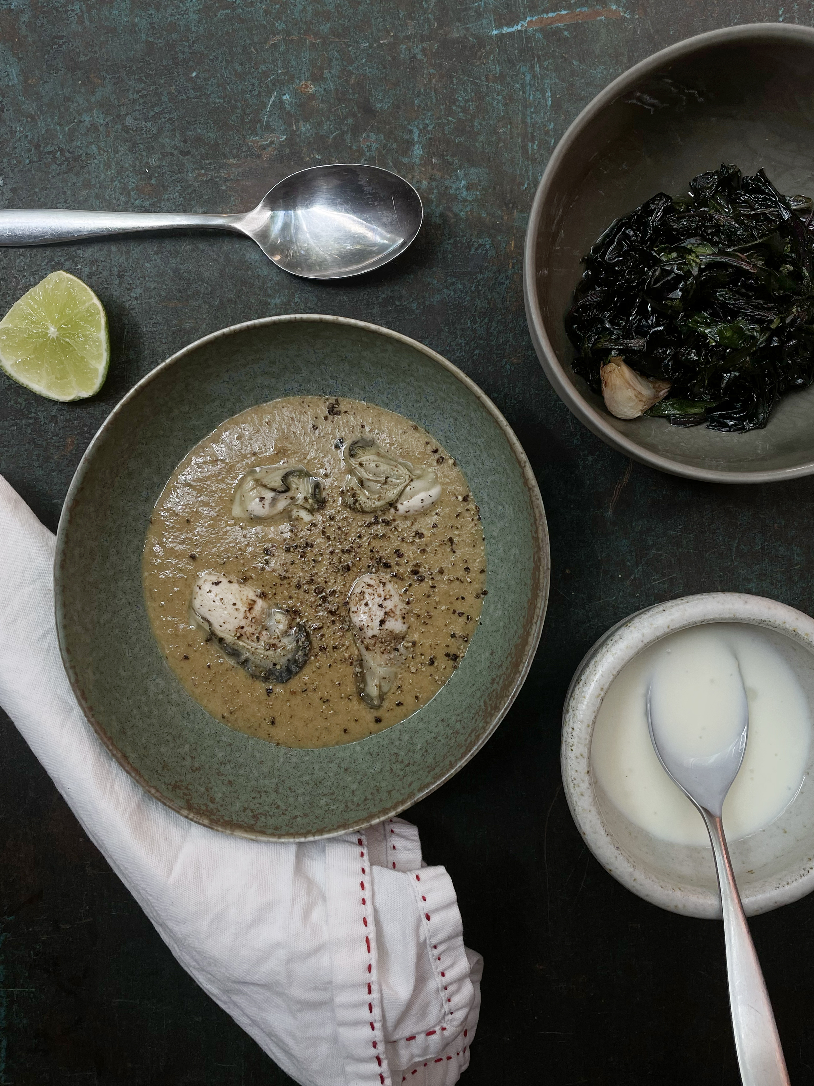 Dark oyster soup
