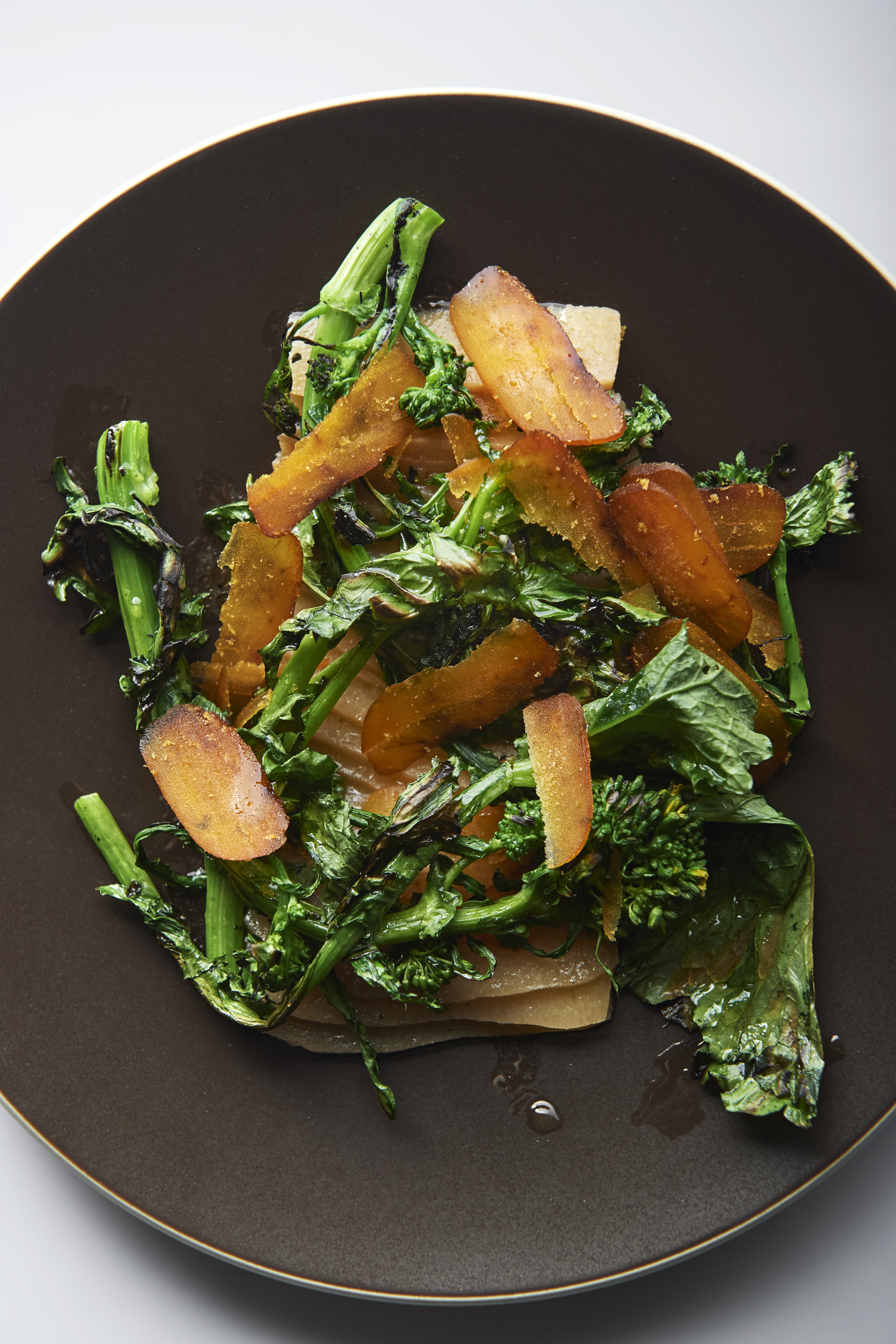 Pickled quince with cime di rapa and bottarga