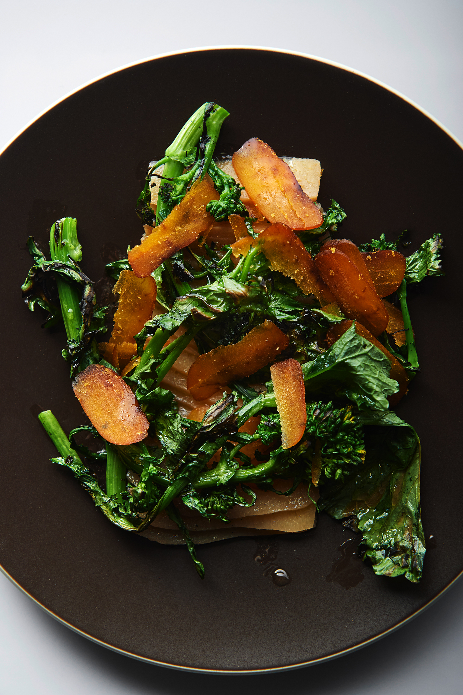 Pickled quince with cime di rapa and bottarga