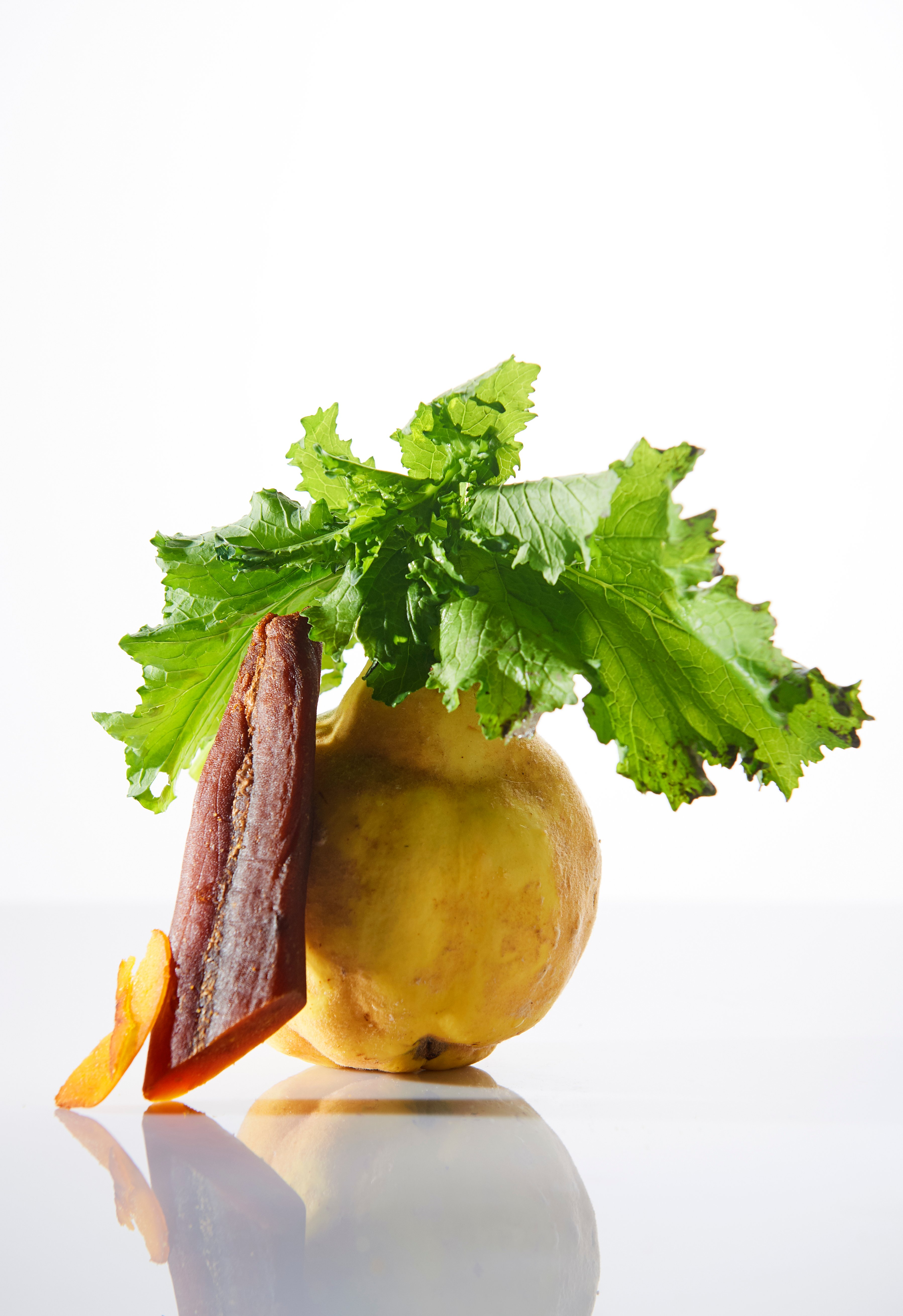 Pickled quince with cime di rapa and bottarga