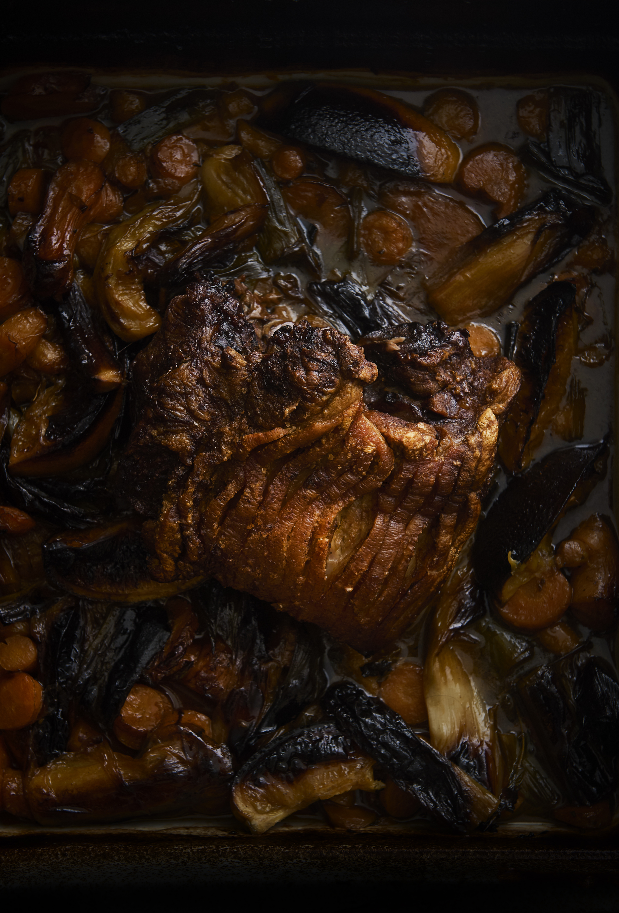 Slow-roasted pork shoulder with braised red cabbage
