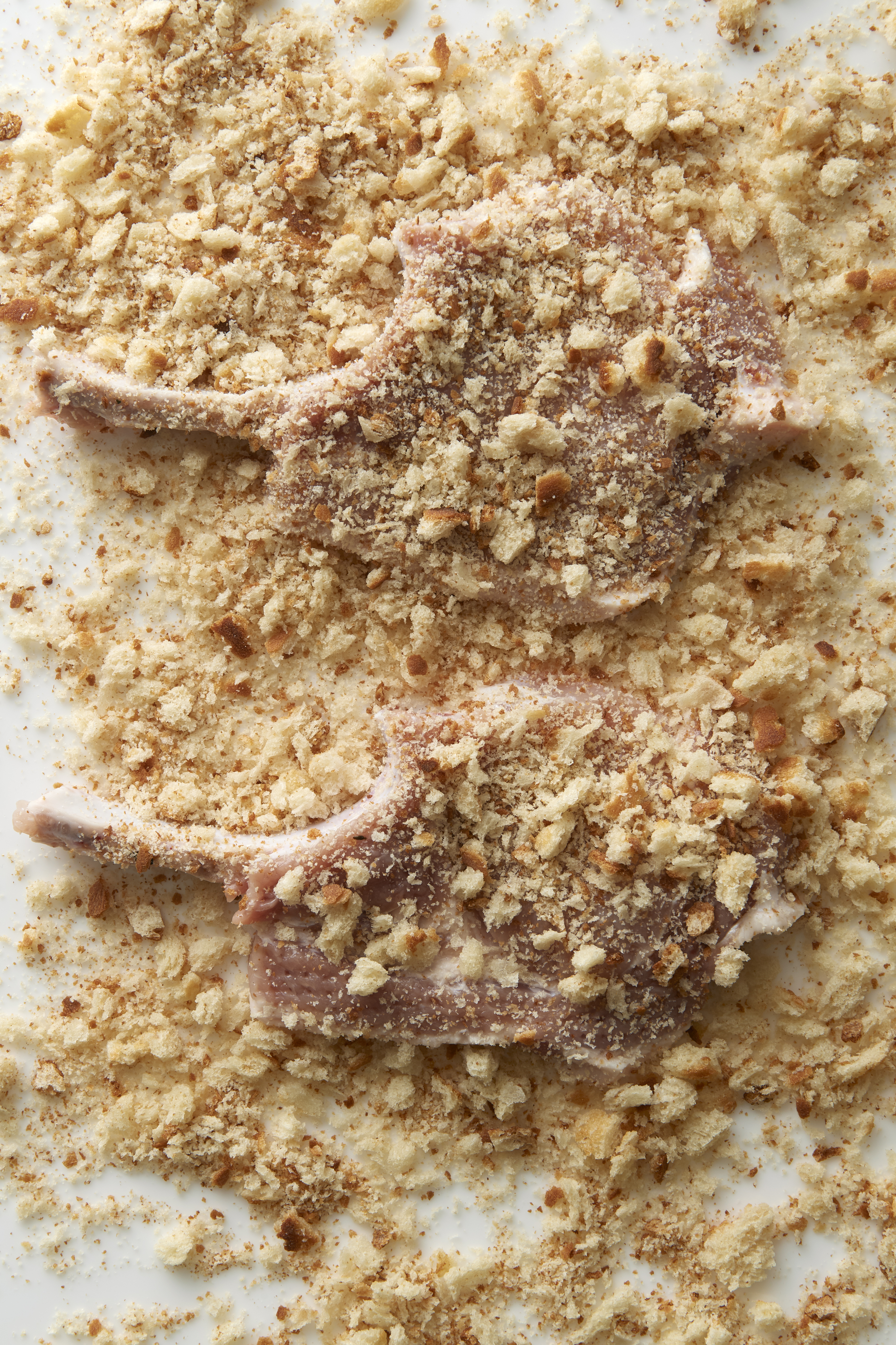 Crumbed pork chops with celeriac remoulade