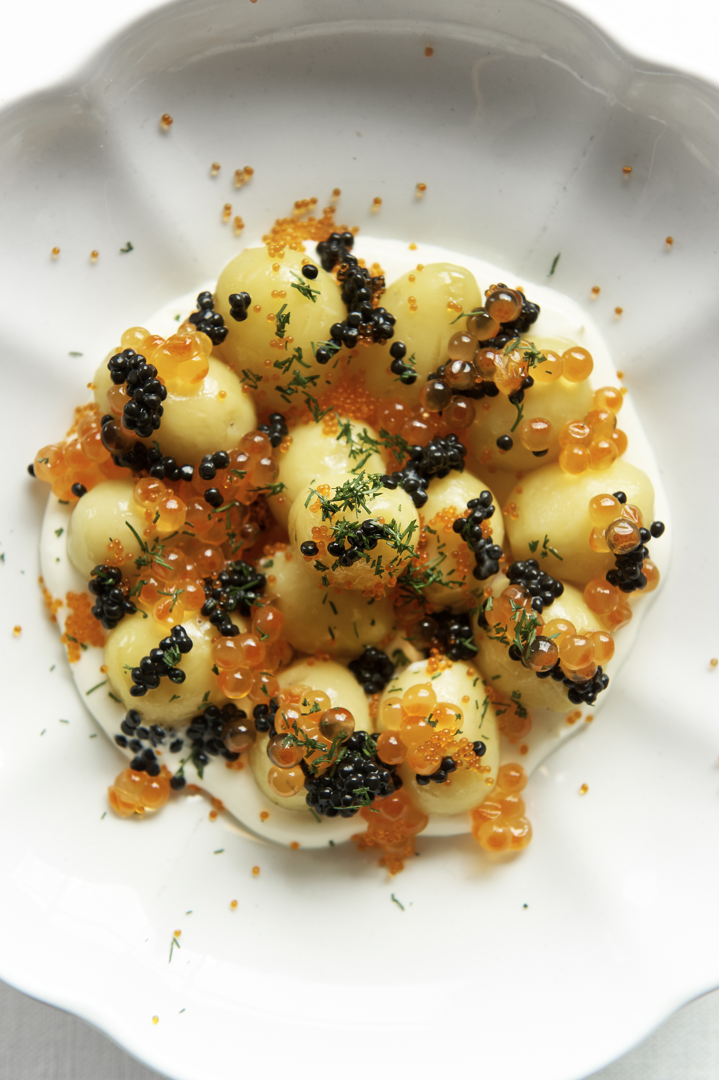 Potato salad with Avruga, tobiko and salmon roe