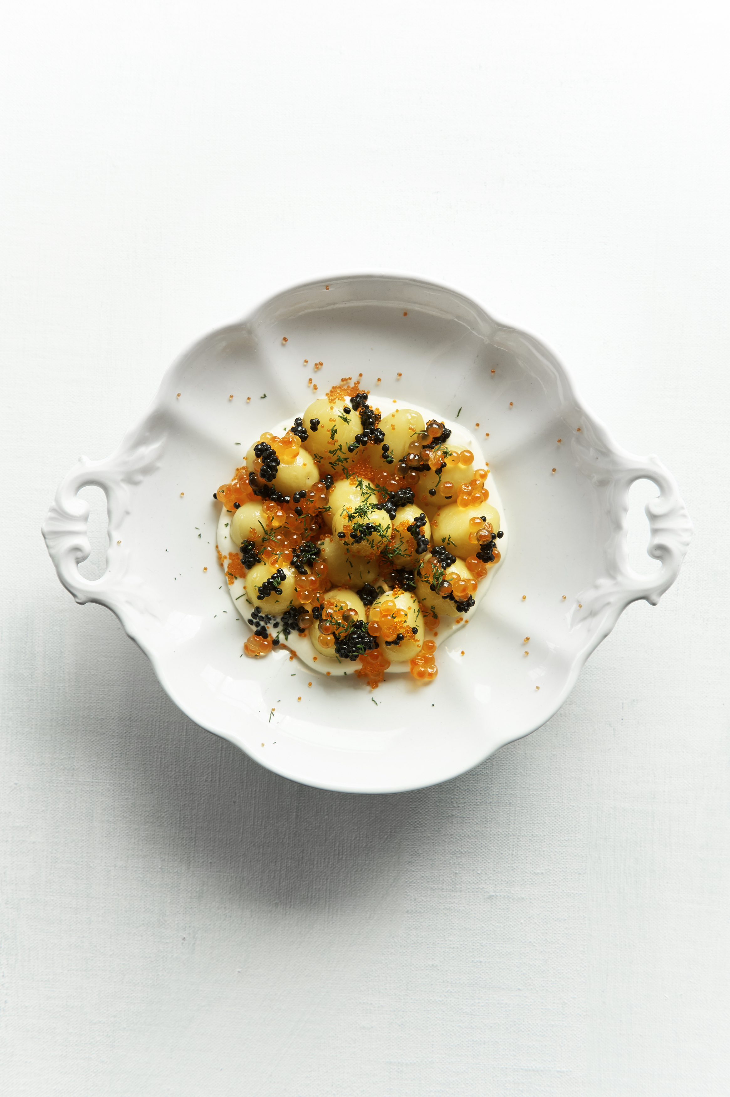 Potato salad with Avruga, tobiko and salmon roe